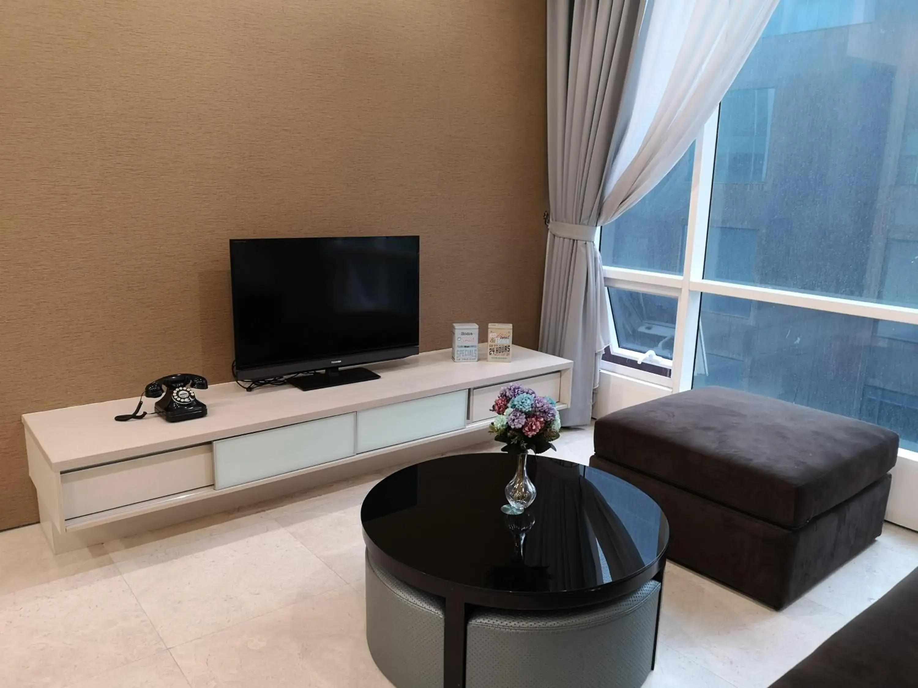 TV/Entertainment Center in Soho Suites KLCC by the Betty Roux