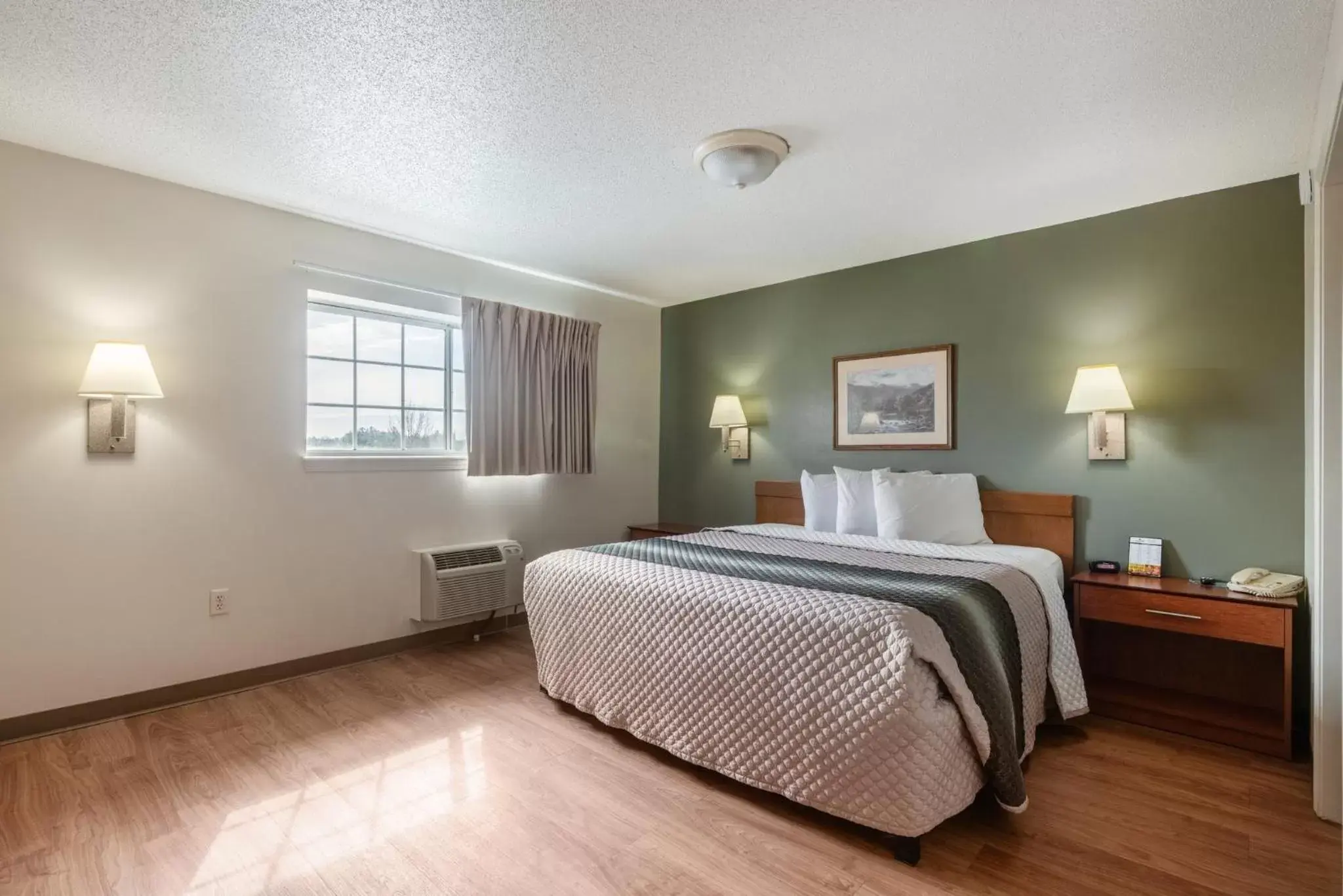 Bedroom, Bed in HomeTowne Studios & Suites by Red Roof Charlotte - Concord