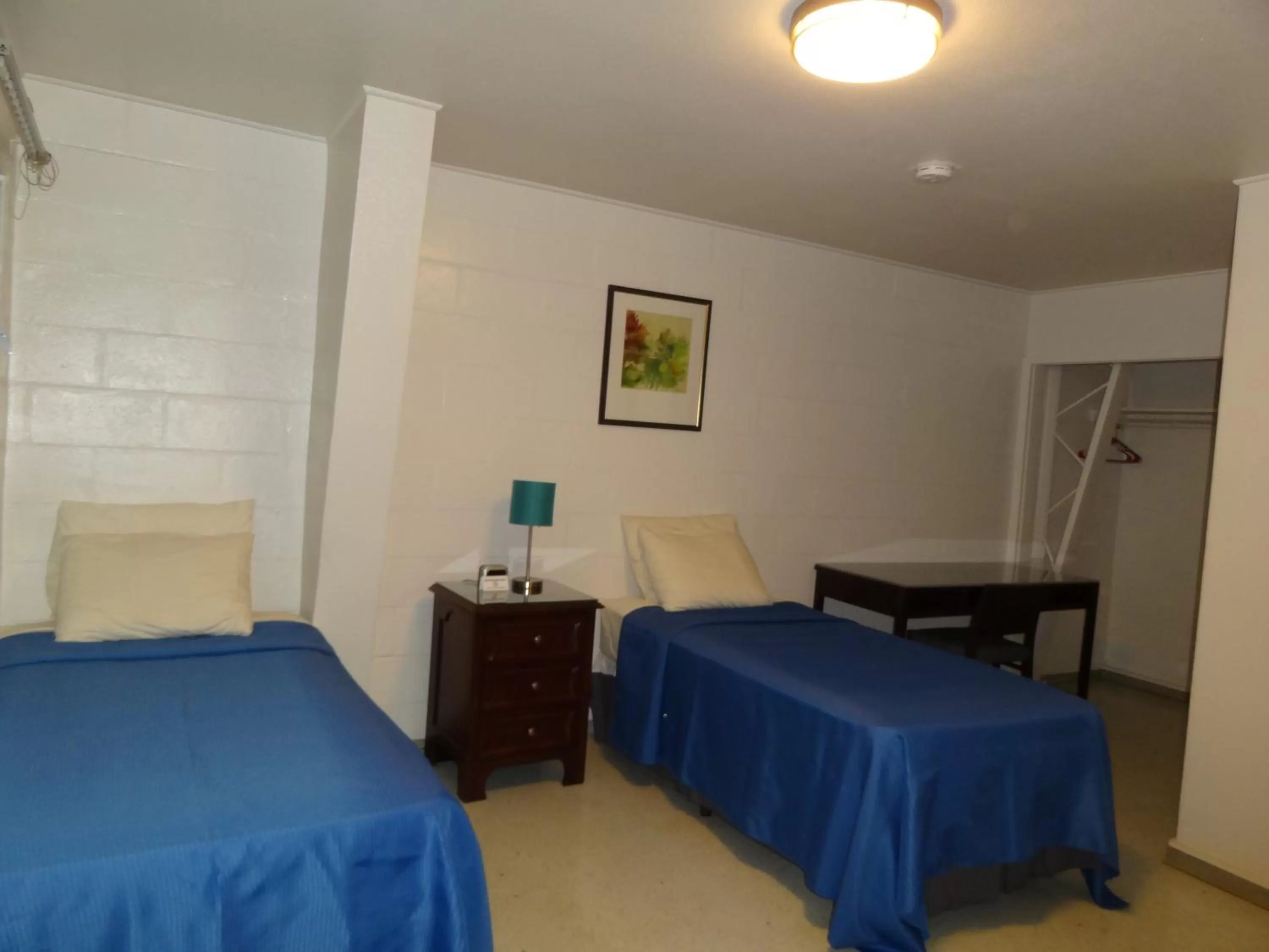 Bed in Tip Top Motel