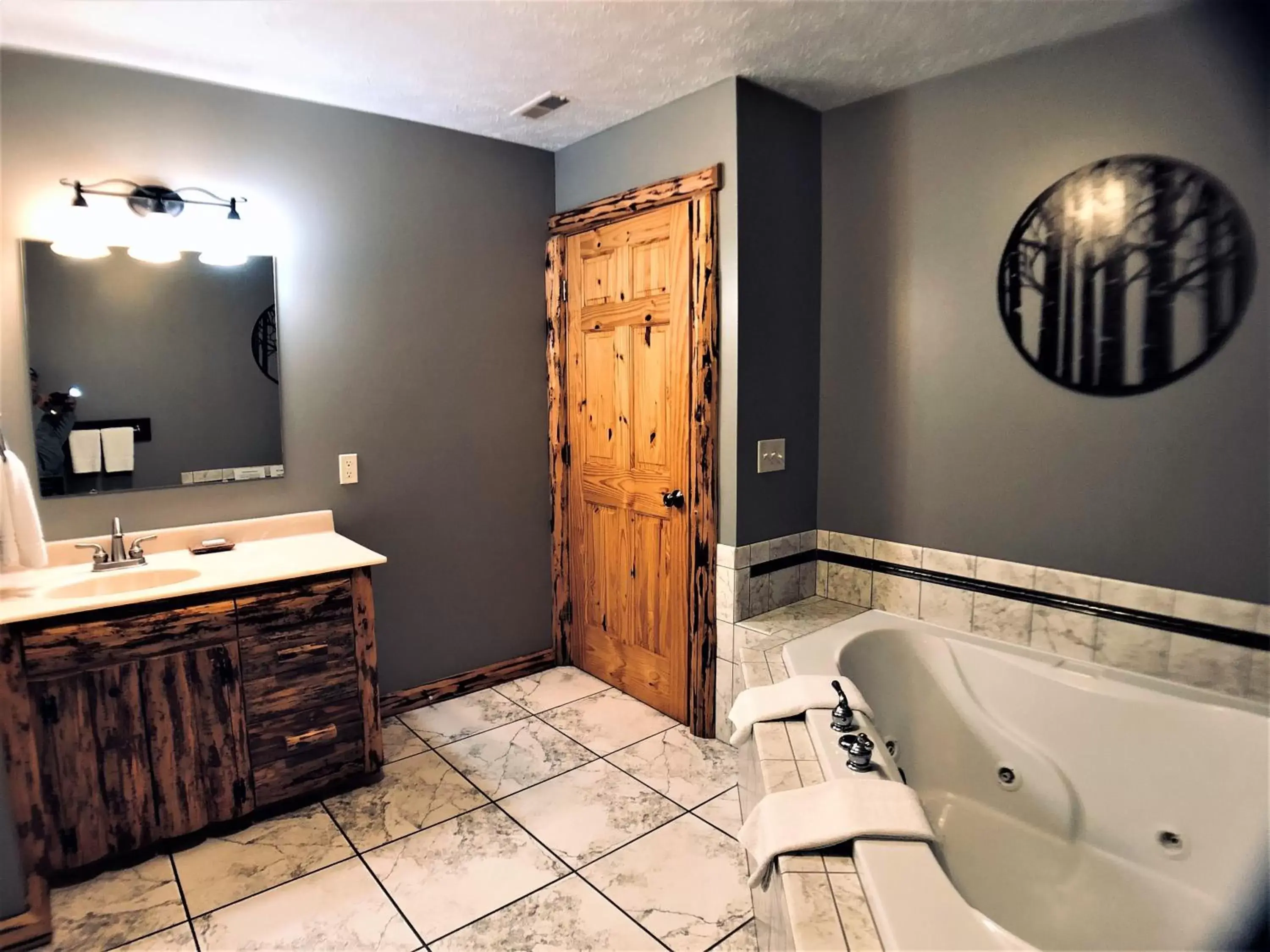Bathroom in Sojourner's Lodge & Log Cabin Suites