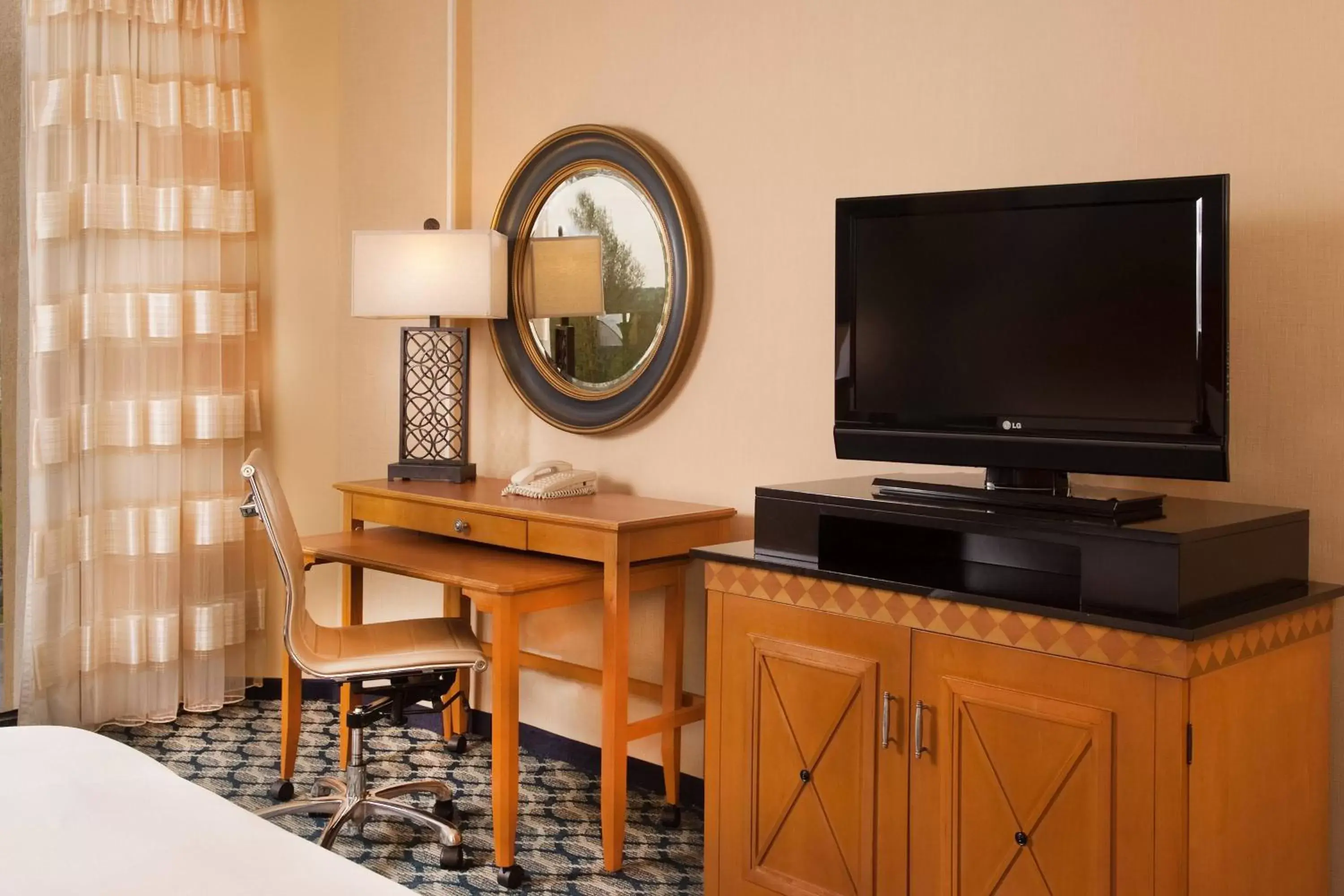 Photo of the whole room, TV/Entertainment Center in Greenville Marriott