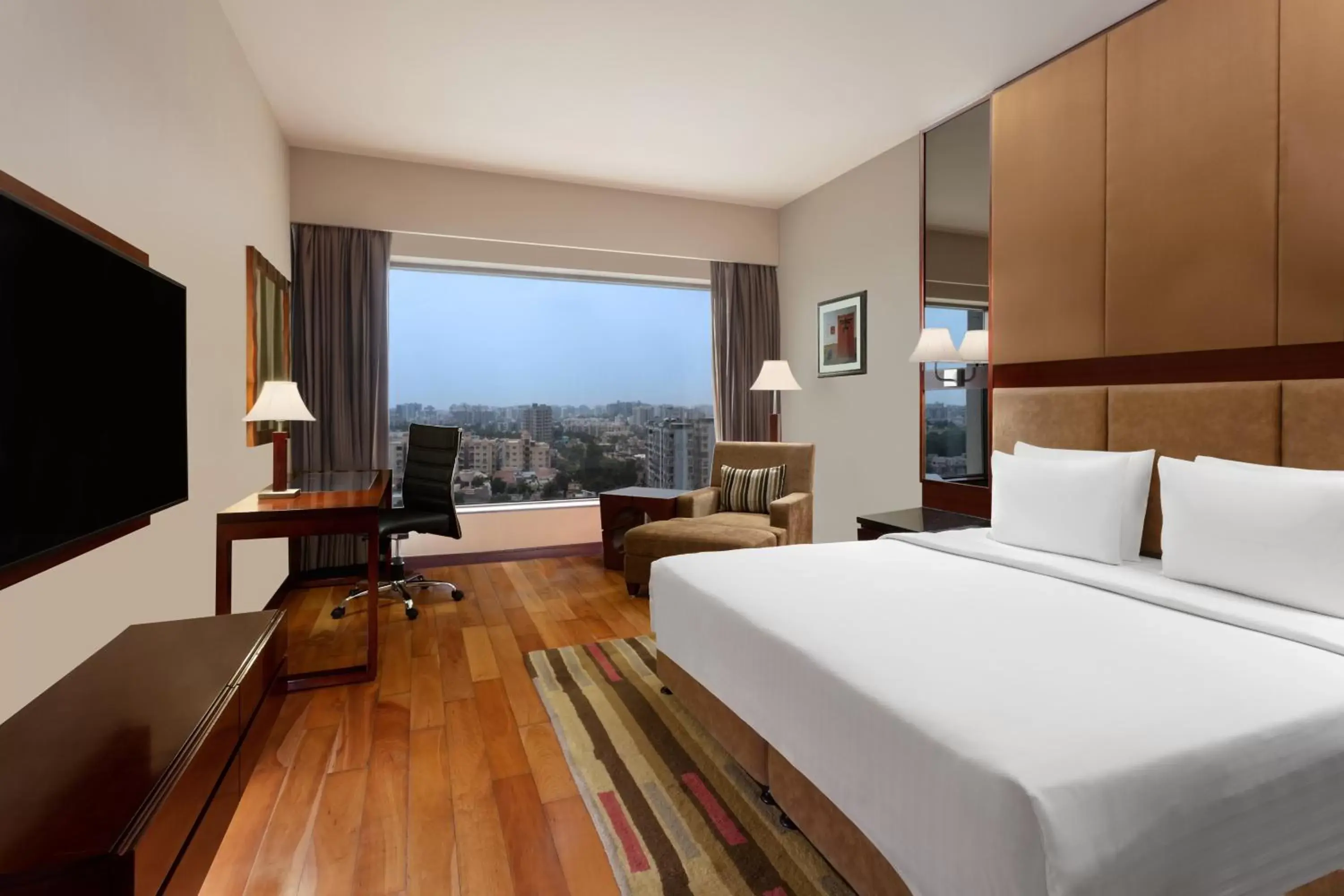 One-Bedroom Deluxe Suite with Executive Lounge Access and with 20 percent discount on food and beverages in Le Meridien Ahmedabad One-Bedroom Deluxe Suite with Executive Lounge Access and with 20 percent discount on food and beverages in Le Meridien Ahmedabad