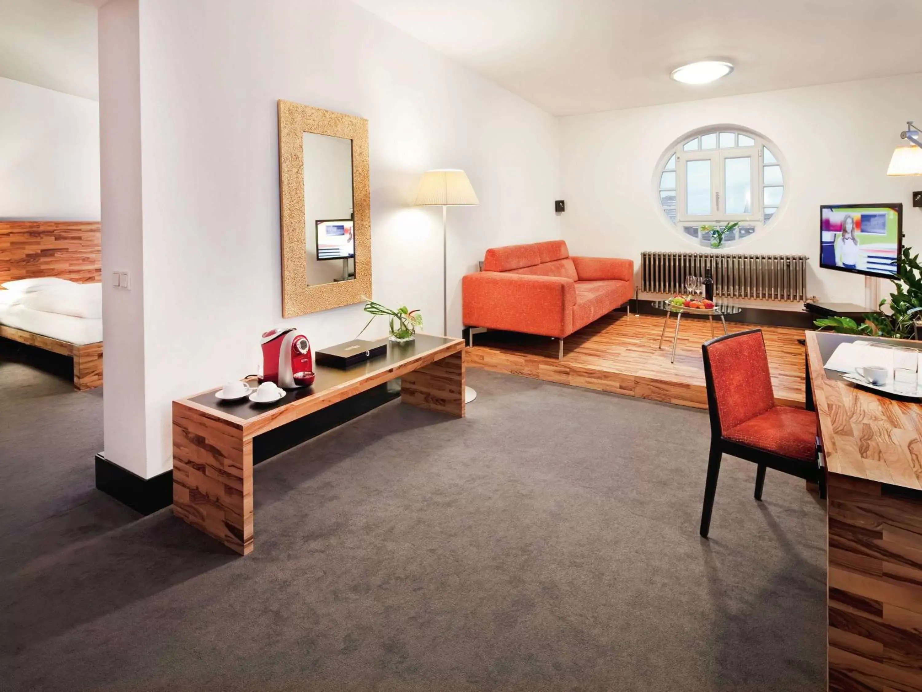 Photo of the whole room, Seating Area in Mövenpick Hotel Berlin Am Potsdamer Platz