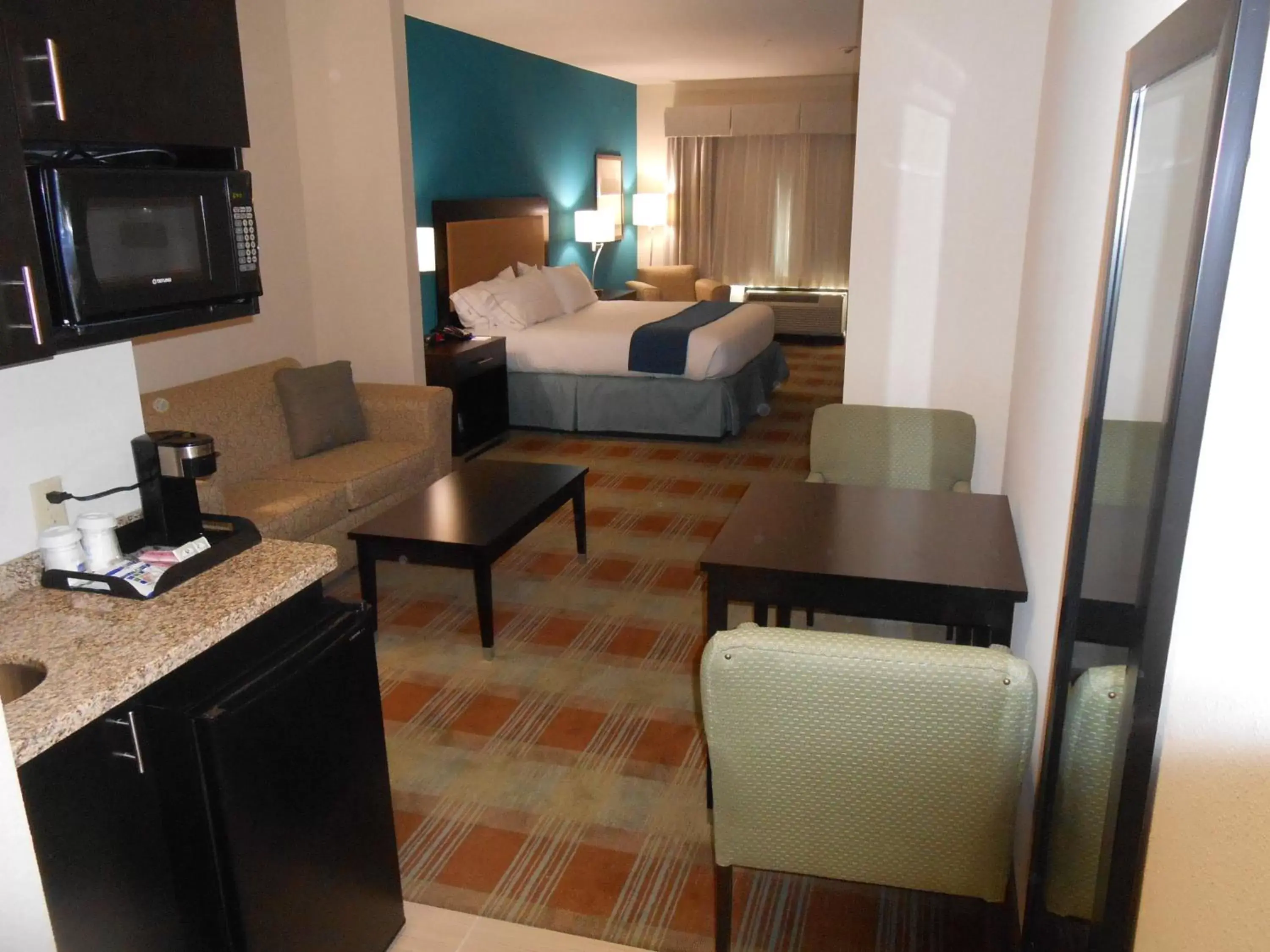 Photo of the whole room, TV/Entertainment Center in Holiday Inn Express & Suites Houston Northwest-Brookhollow, an IHG Hotel