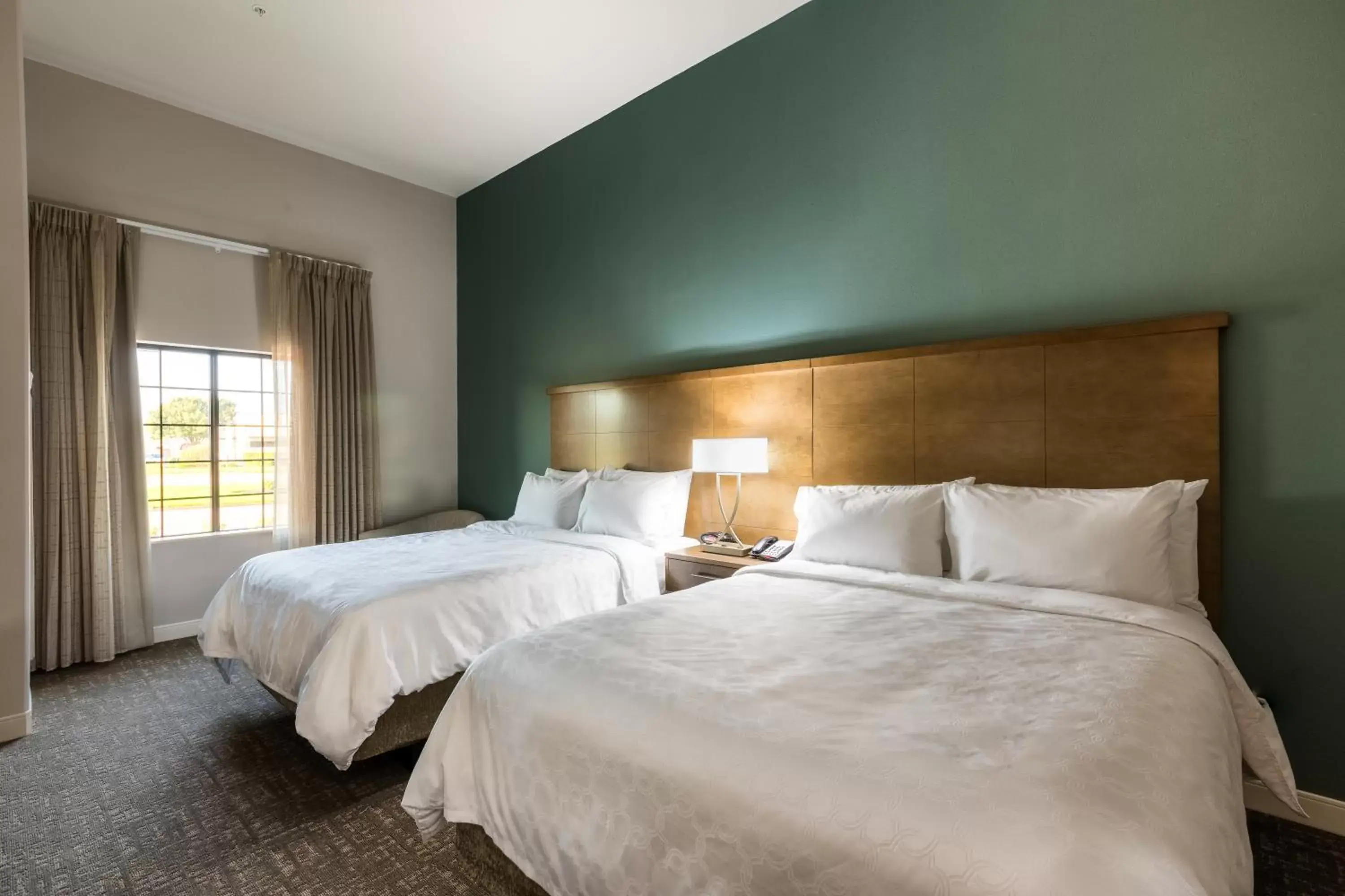Bed in Staybridge Suites - Lake Jackson, an IHG Hotel