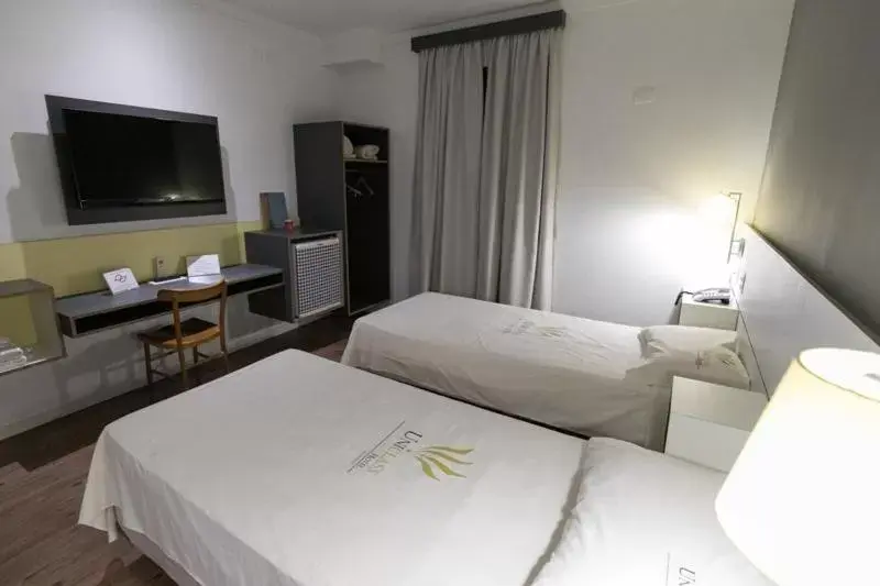 Bedroom, Bed in Uniclass Hotel Pinheiros