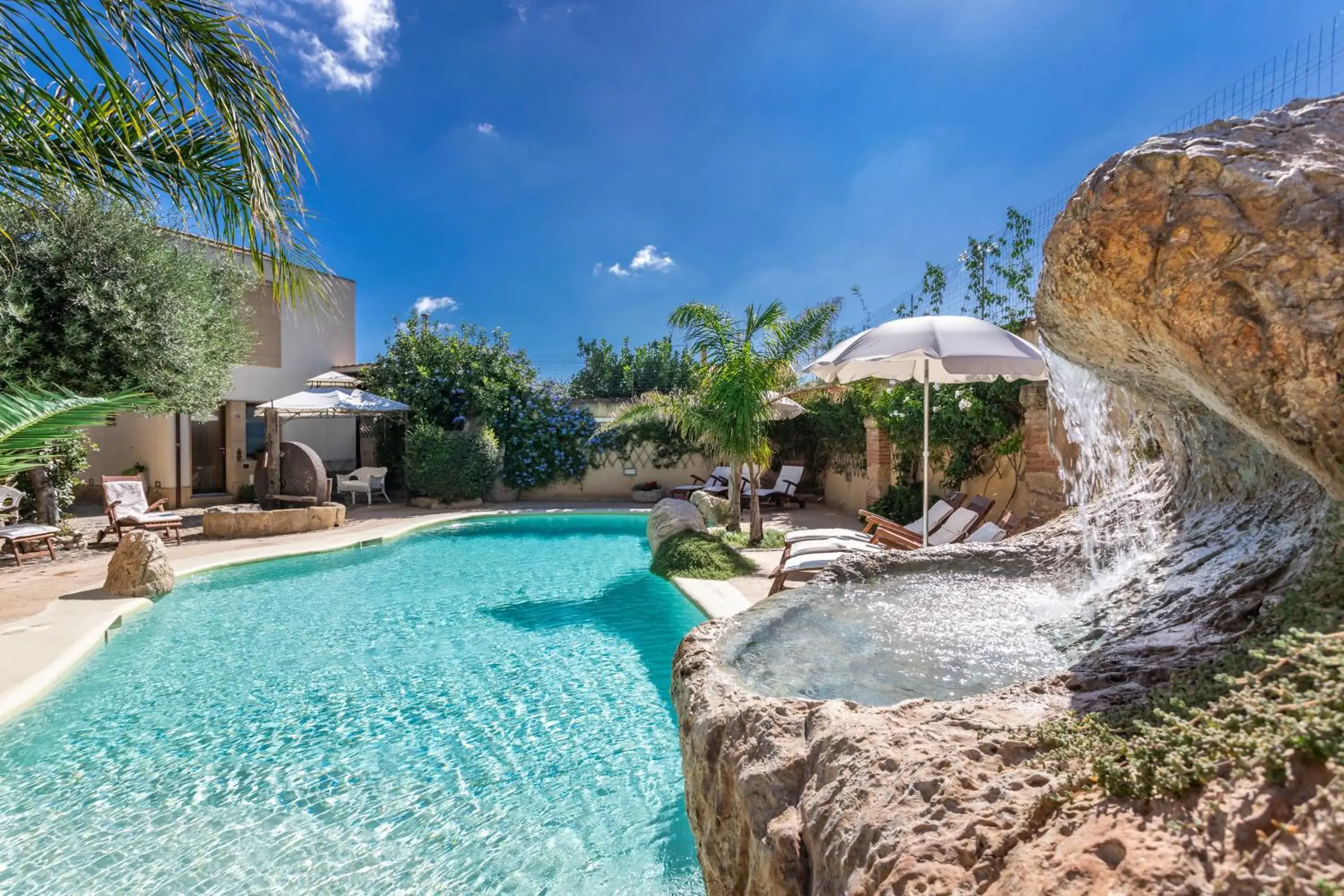Patio, Swimming Pool in Hotel Villa Canu
