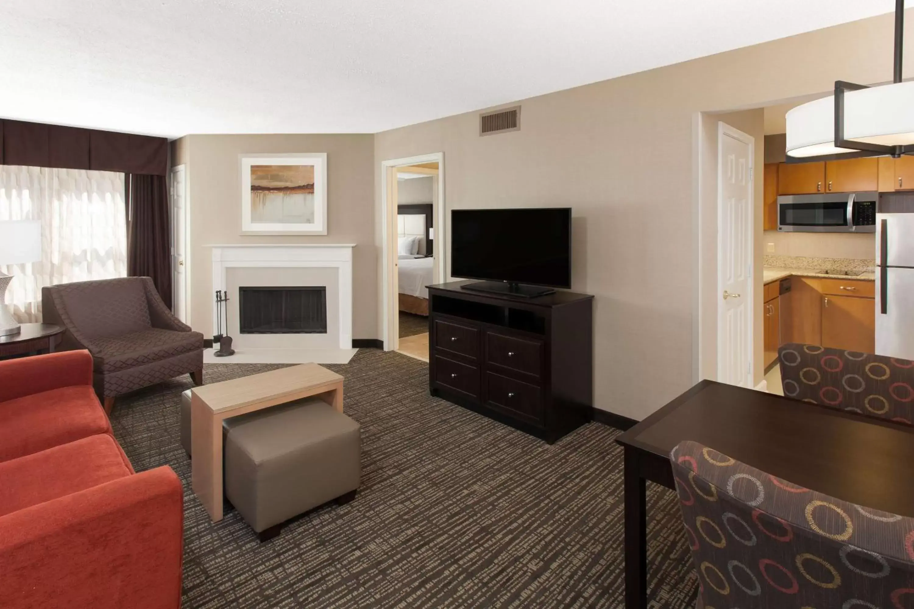 Bedroom, TV/Entertainment Center in Homewood Suites by Hilton Indianapolis At The Crossing