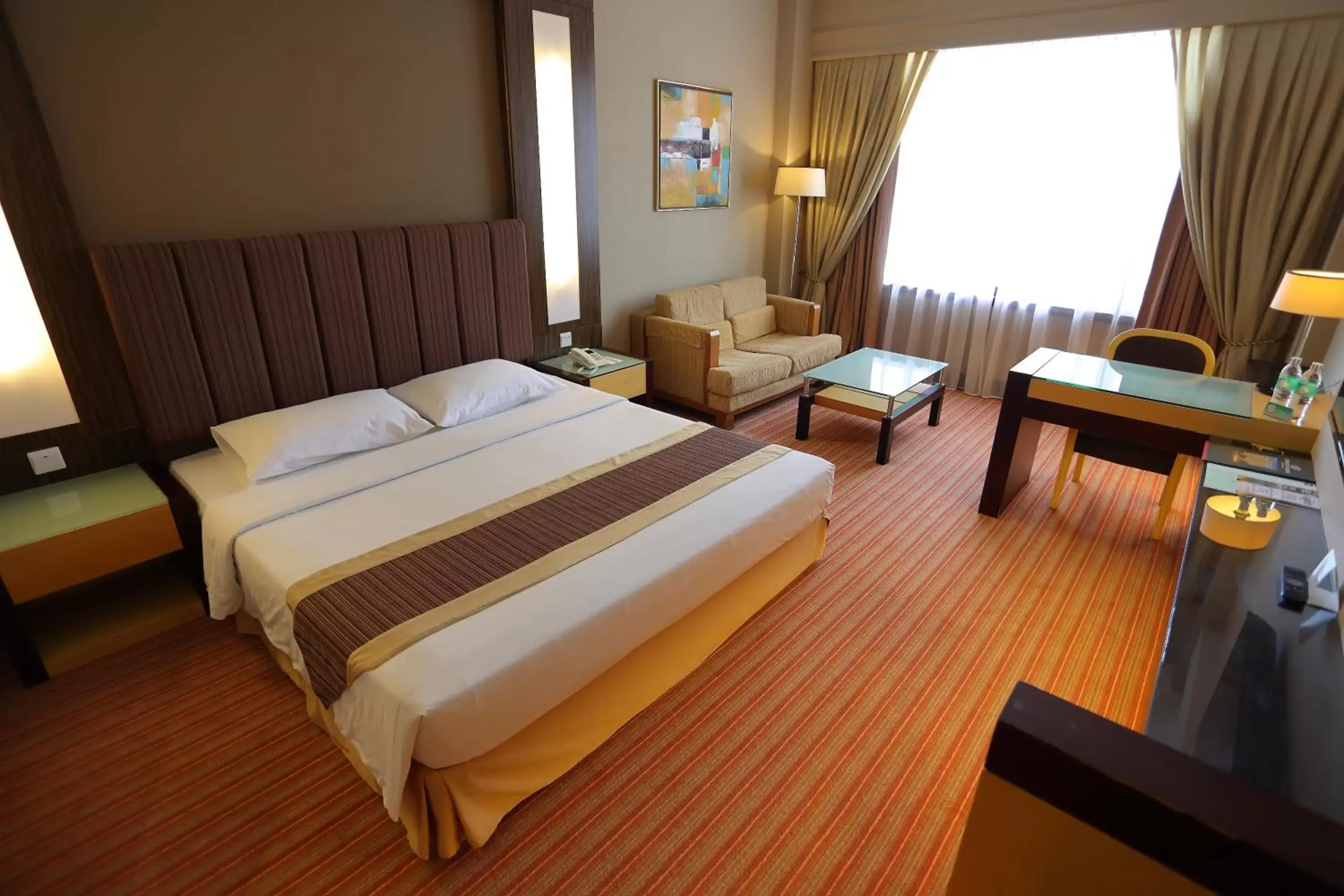 Bed in Dynasty Hotel Miri