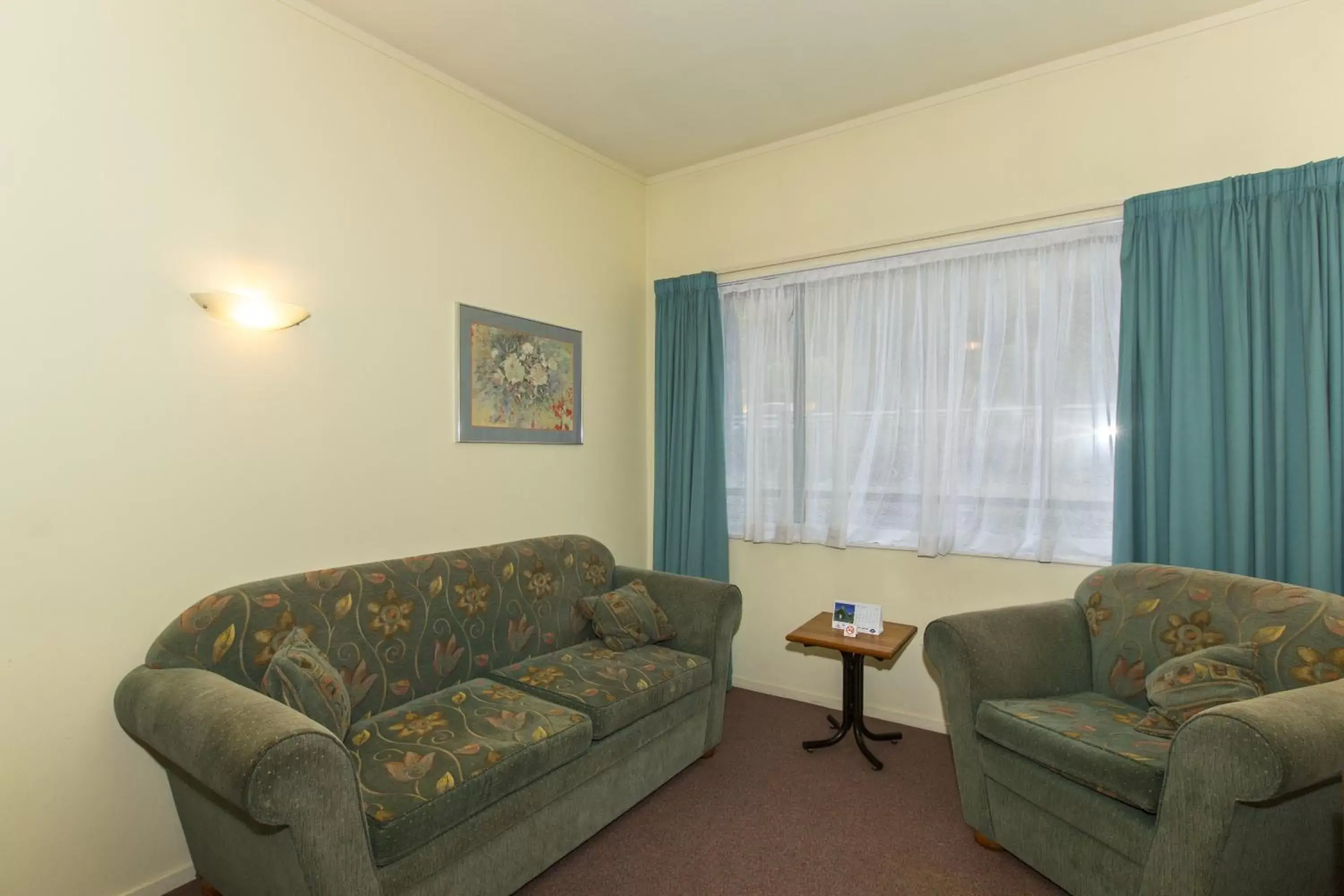 Living room, Seating Area in Fernhill Motor Lodge