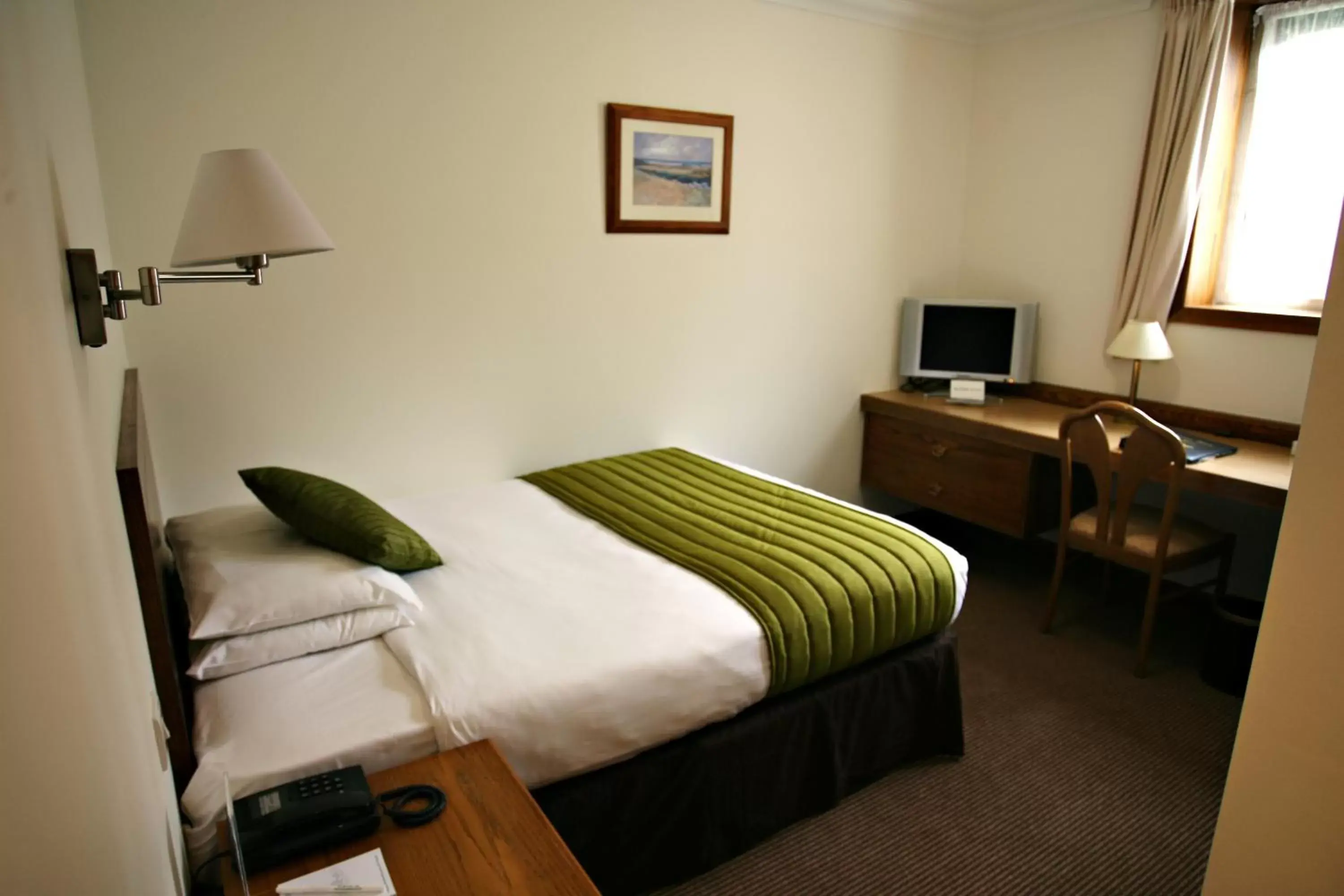Bed in Stanton House Hotel