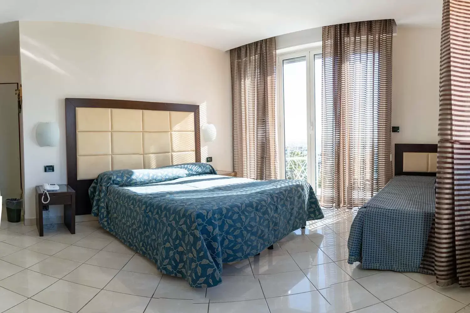 Bed in Hotel Marinella