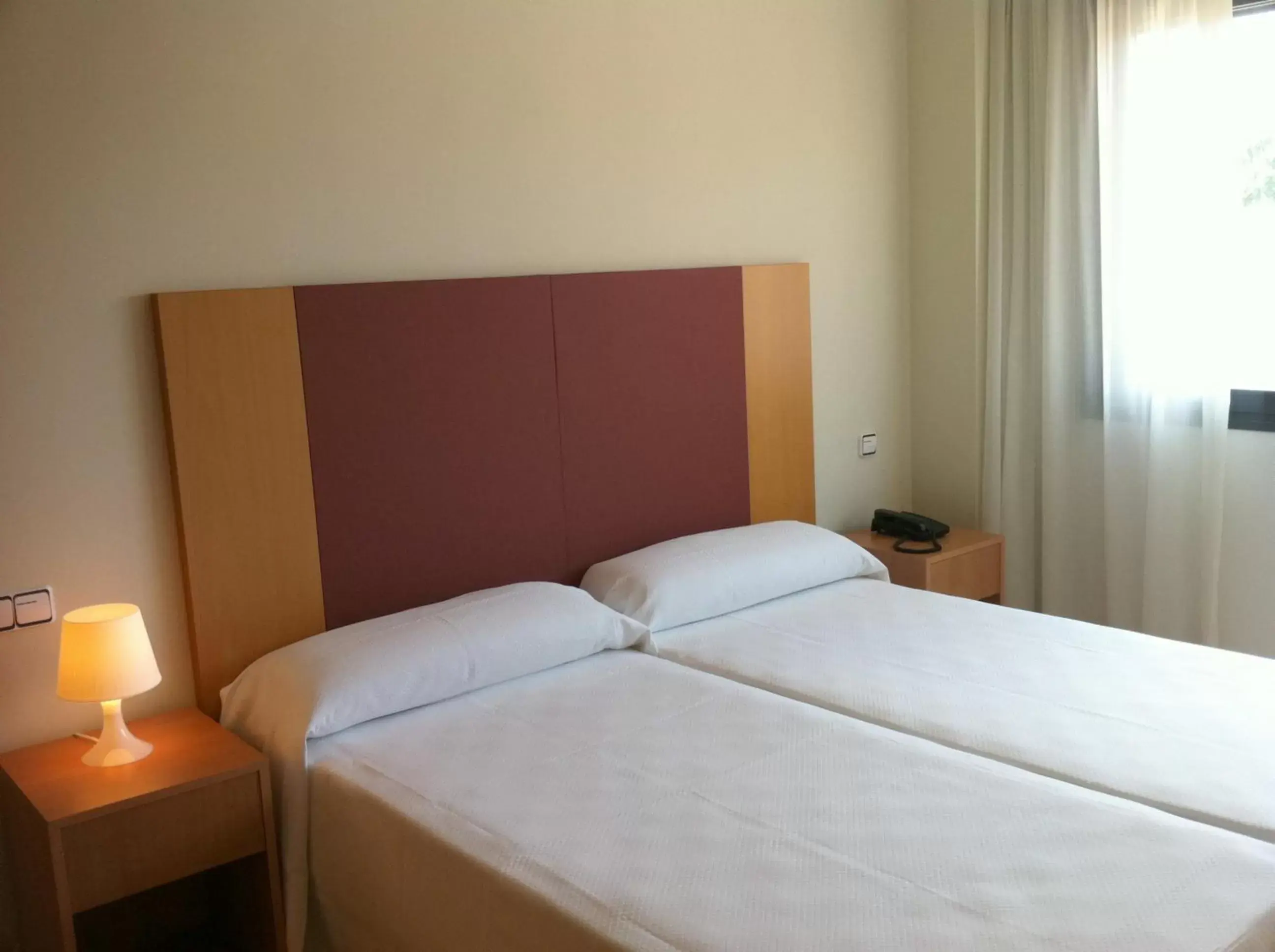 Bed in Hotel-Apartamentos Tartesos