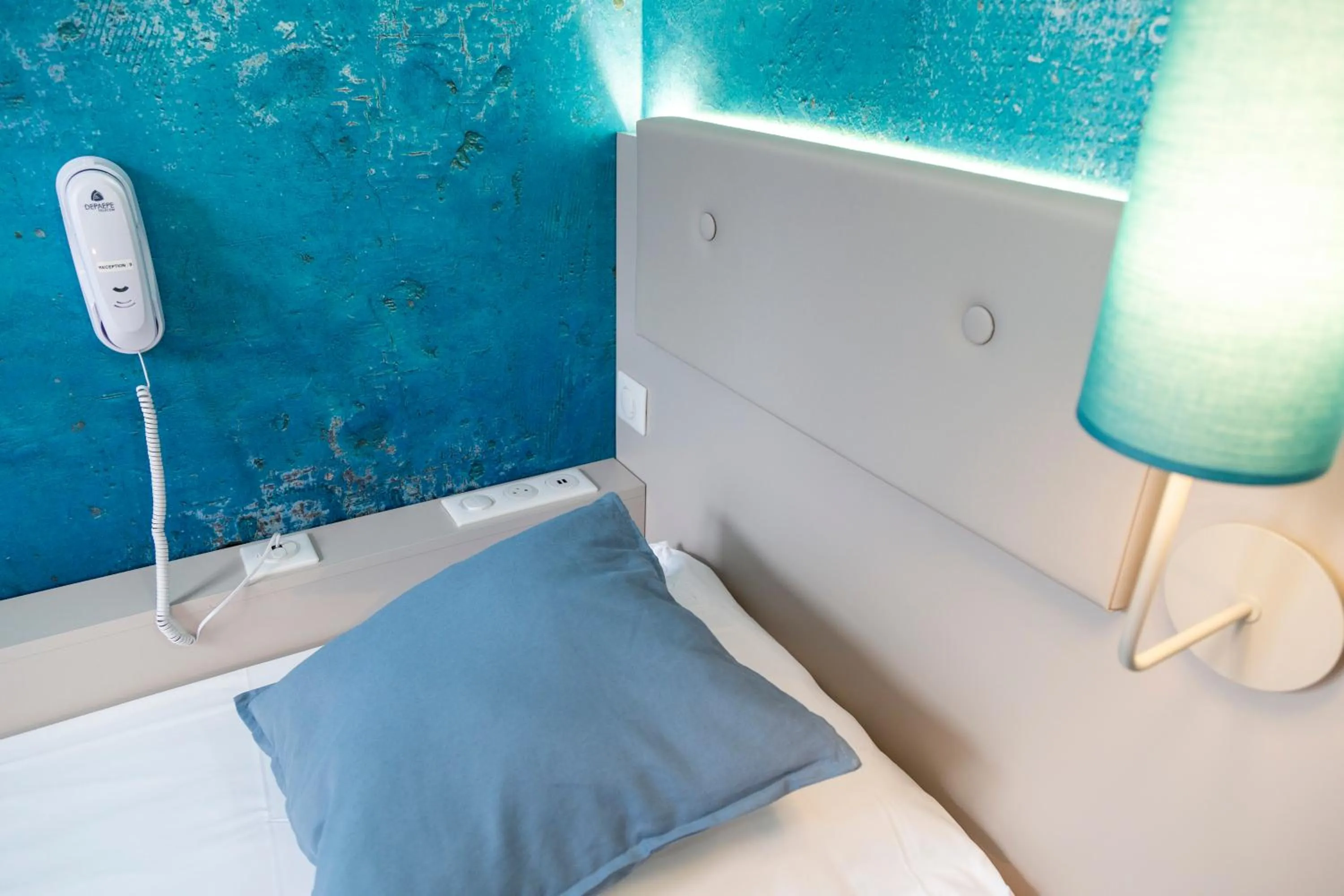 Decorative detail, Bed in Hotel Victoria