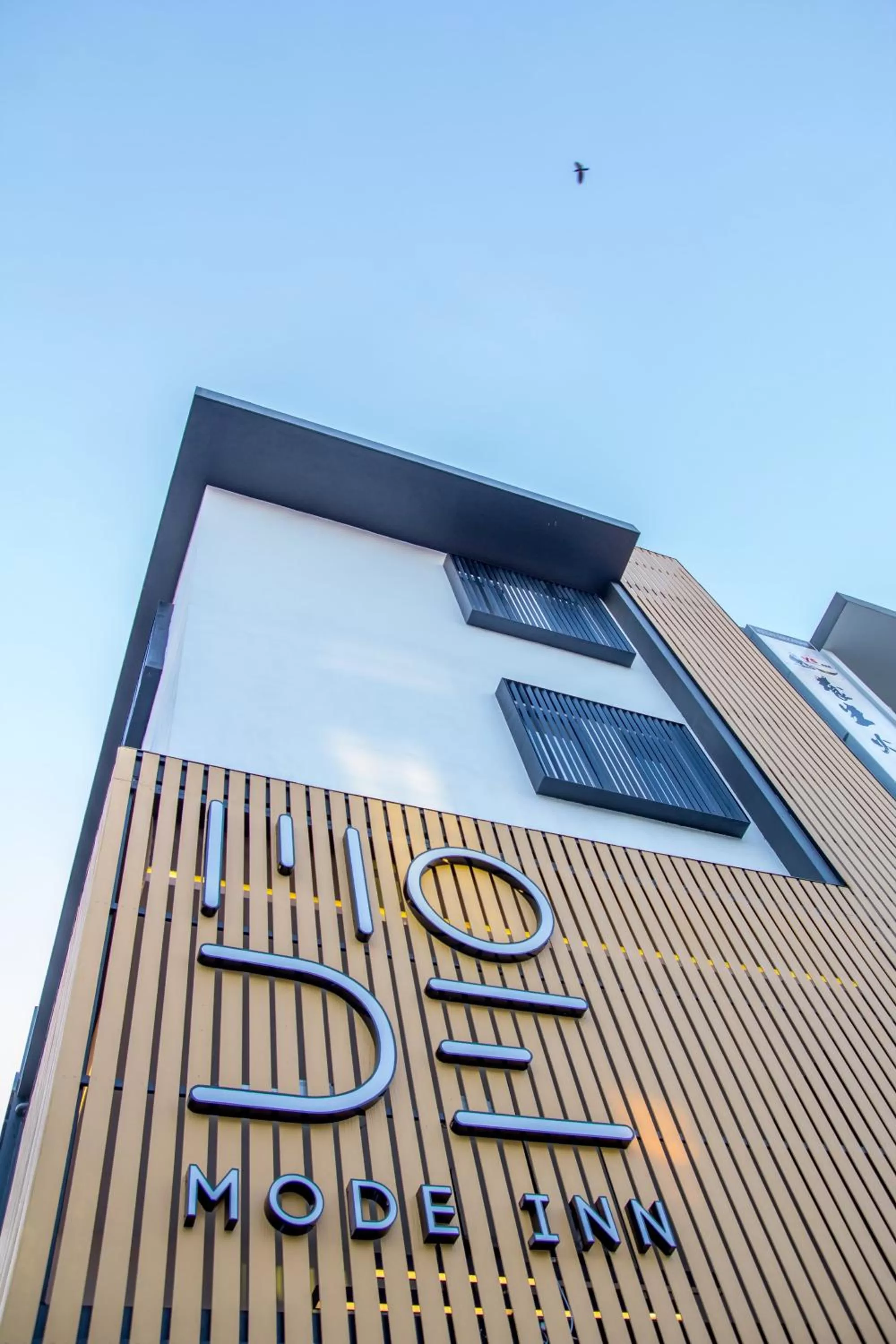 Property logo or sign in Mode Inn Icon City