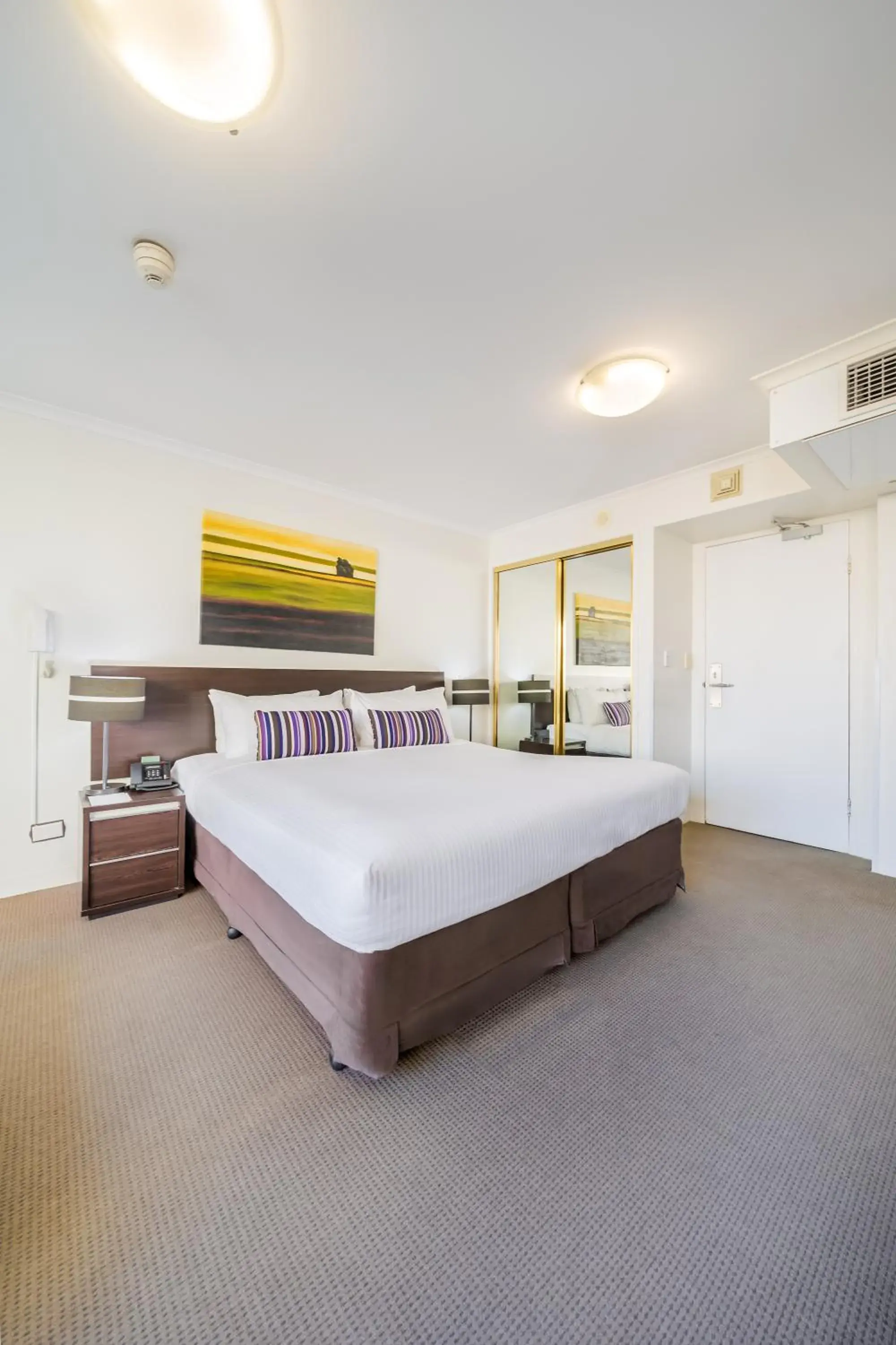 Bed in Oaks Sydney Hyde Park Suites