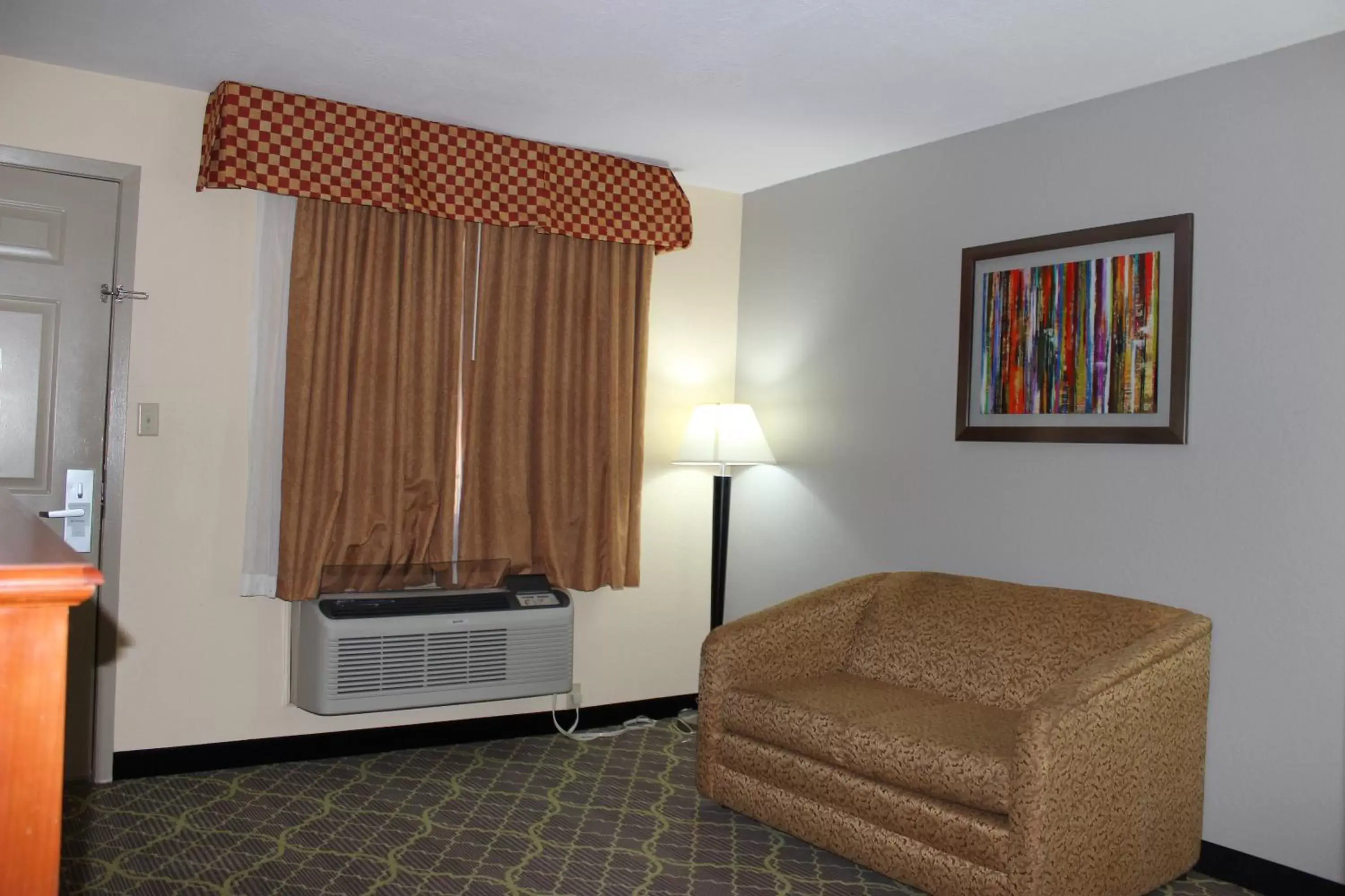 Bedroom, Seating Area in Best Western Jacksonville Inn