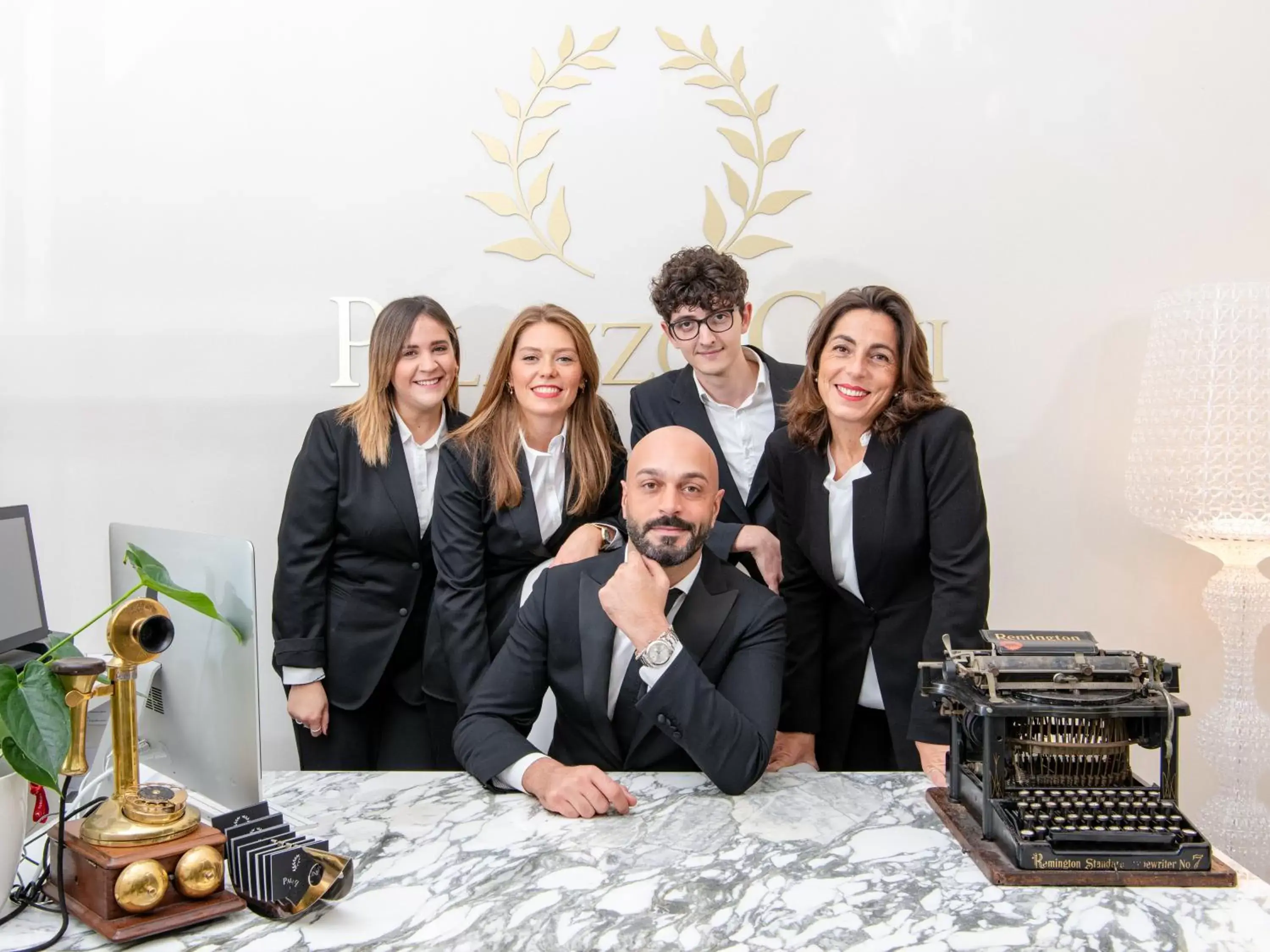 Staff in Palazzo Cini Luxury Rooms in Pisa