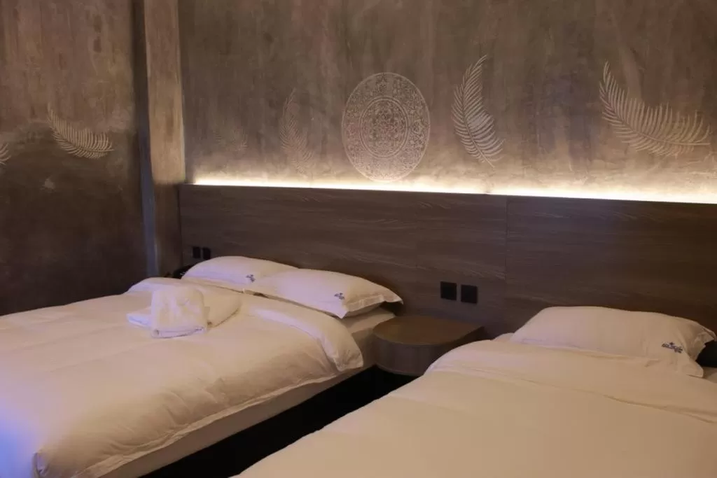 Bed in Sri Indar Hotel & Suites