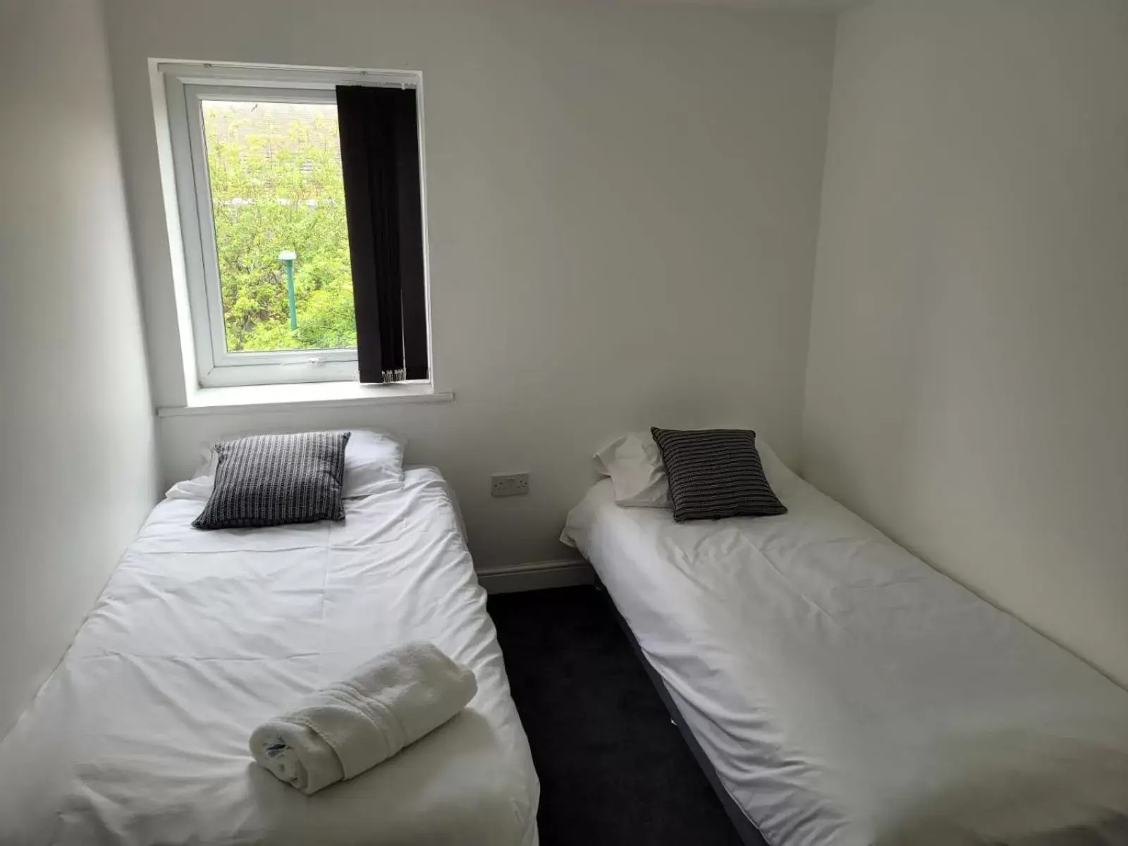 Bedroom, Bed in OYO Victoria Apartments