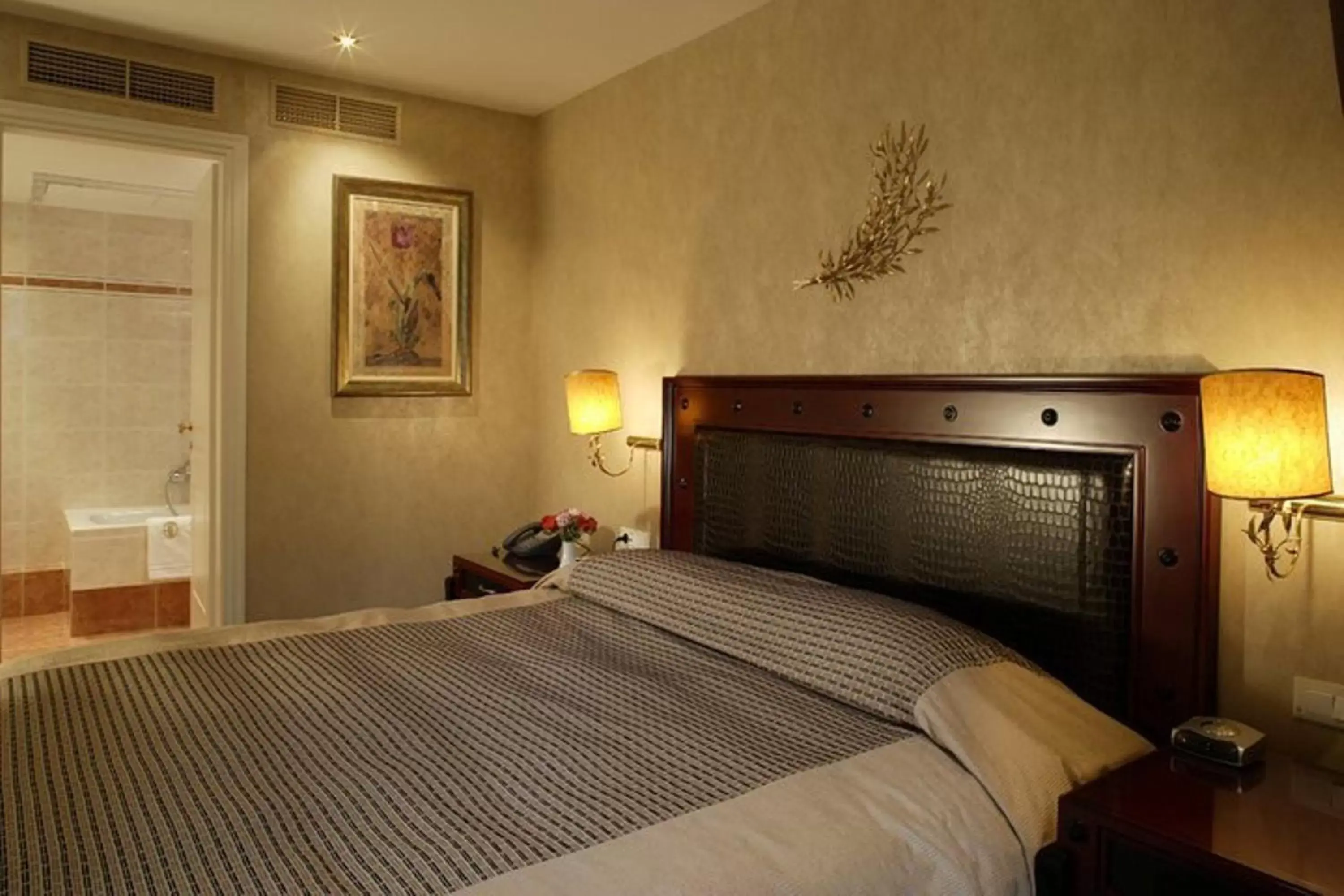 Bed in Theoxenia House Hotel