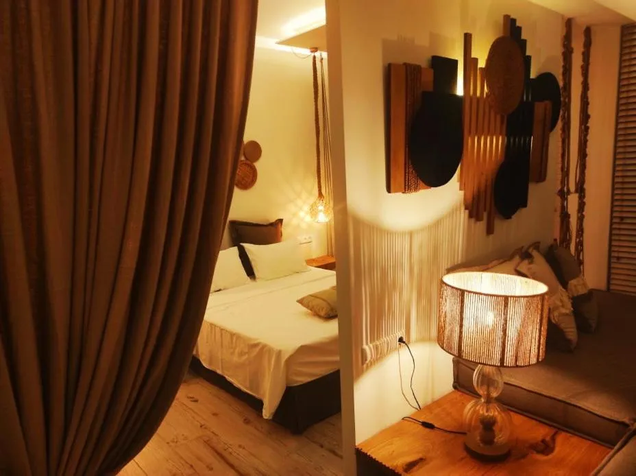 Bed in Karystion Hotel