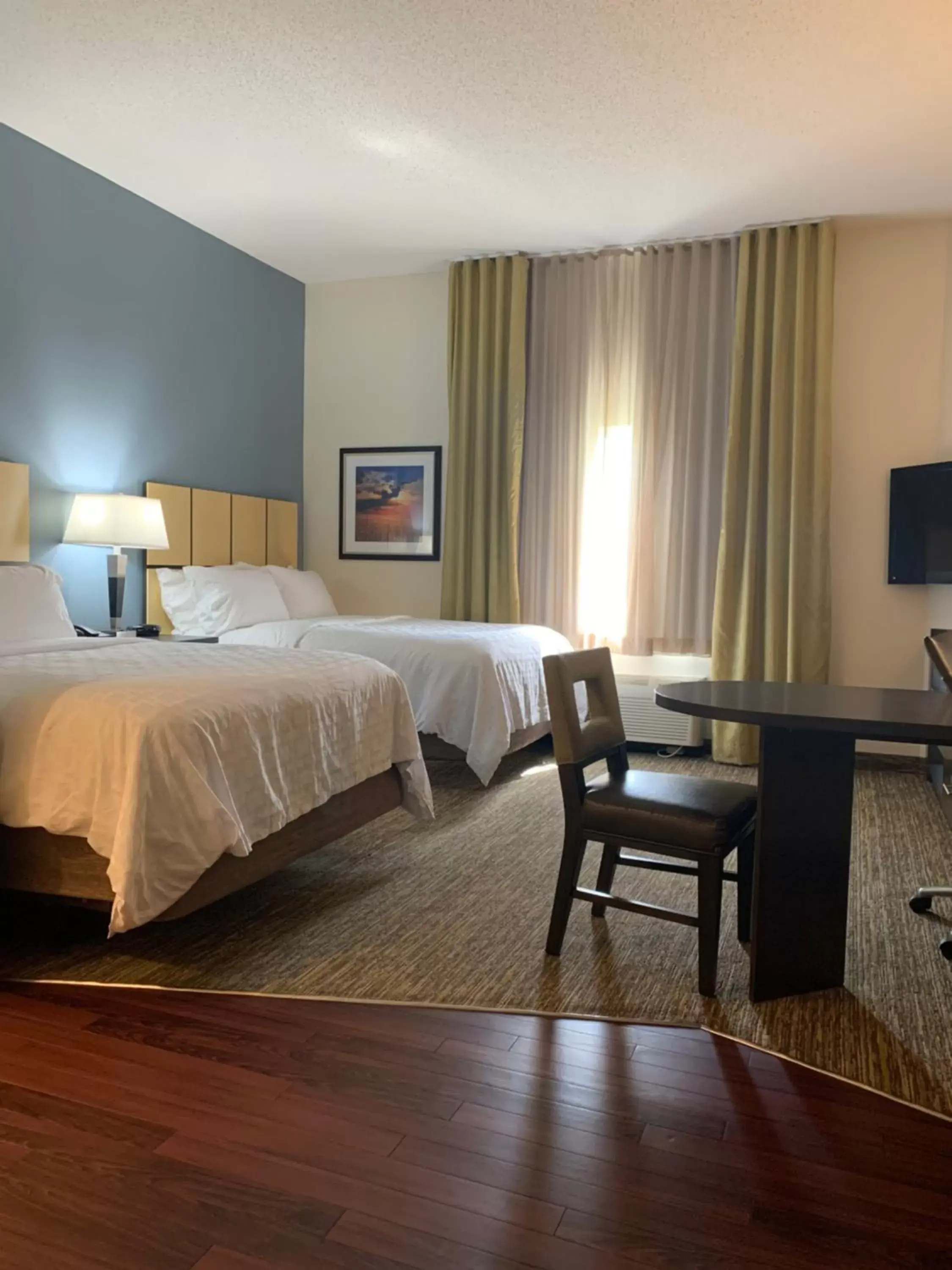Bed in Candlewood Suites Fargo-North Dakota State University, an IHG Hotel