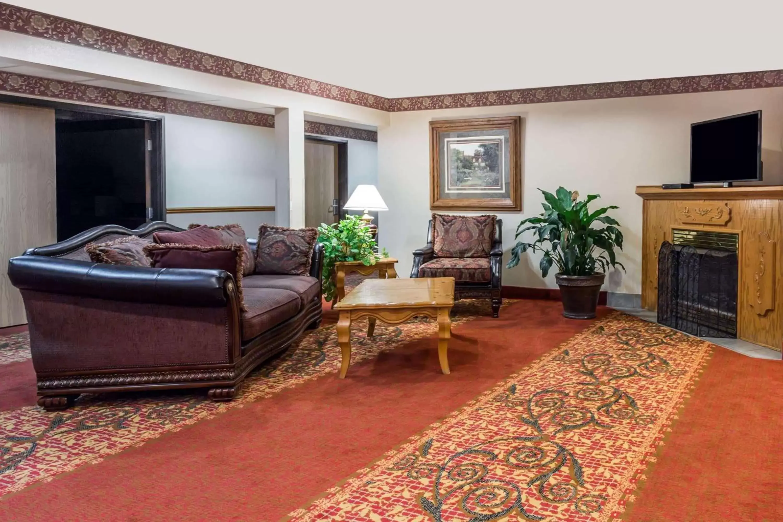 Lobby or reception, Seating Area in Boarders Inn & Suites by Cobblestone Hotels - Brush