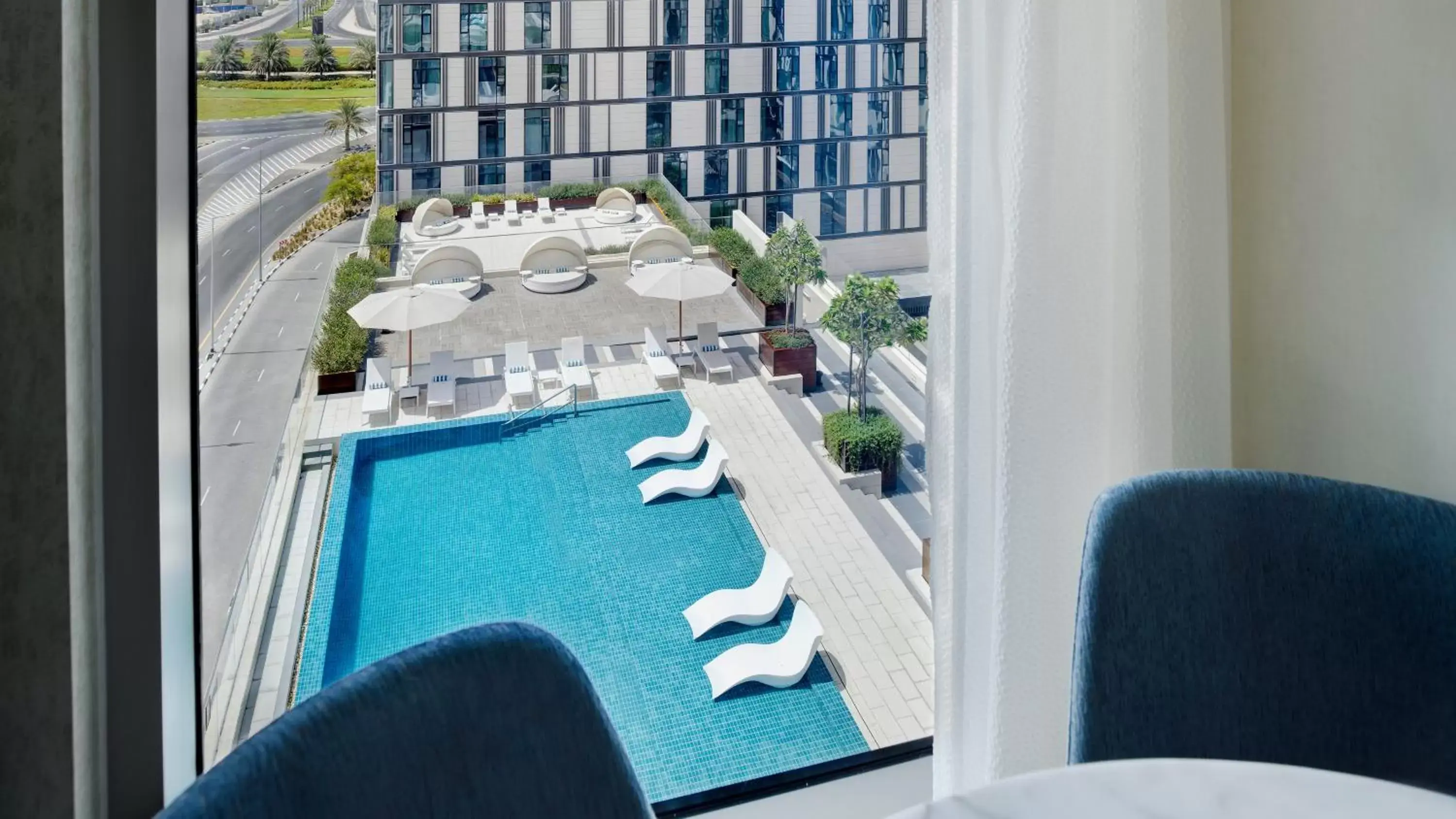 Swimming pool, Pool View in Staybridge Suites Dubai Al-Maktoum Airport, an IHG Hotel
