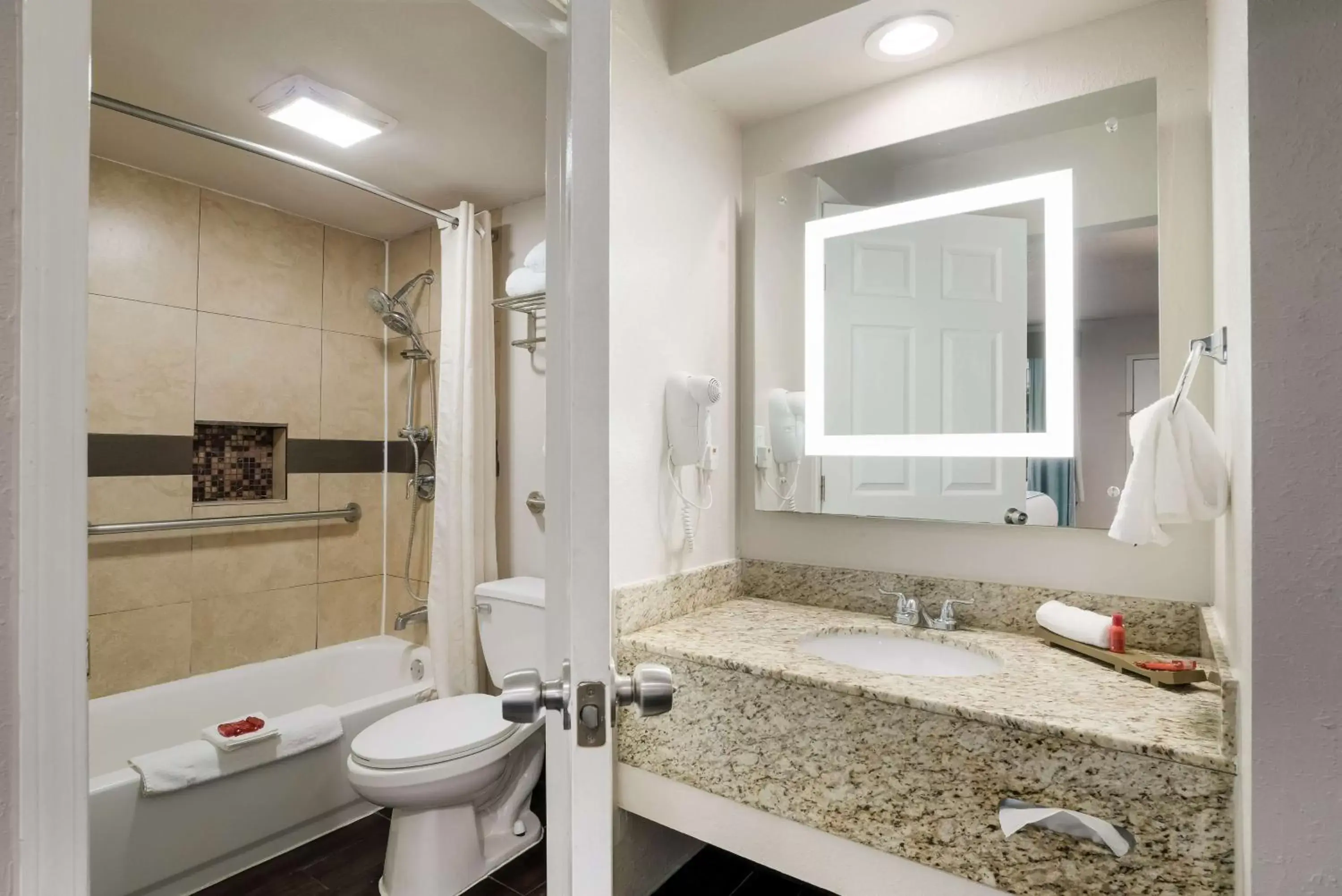 Bathroom in SureStay Hotel Laredo by Best Western