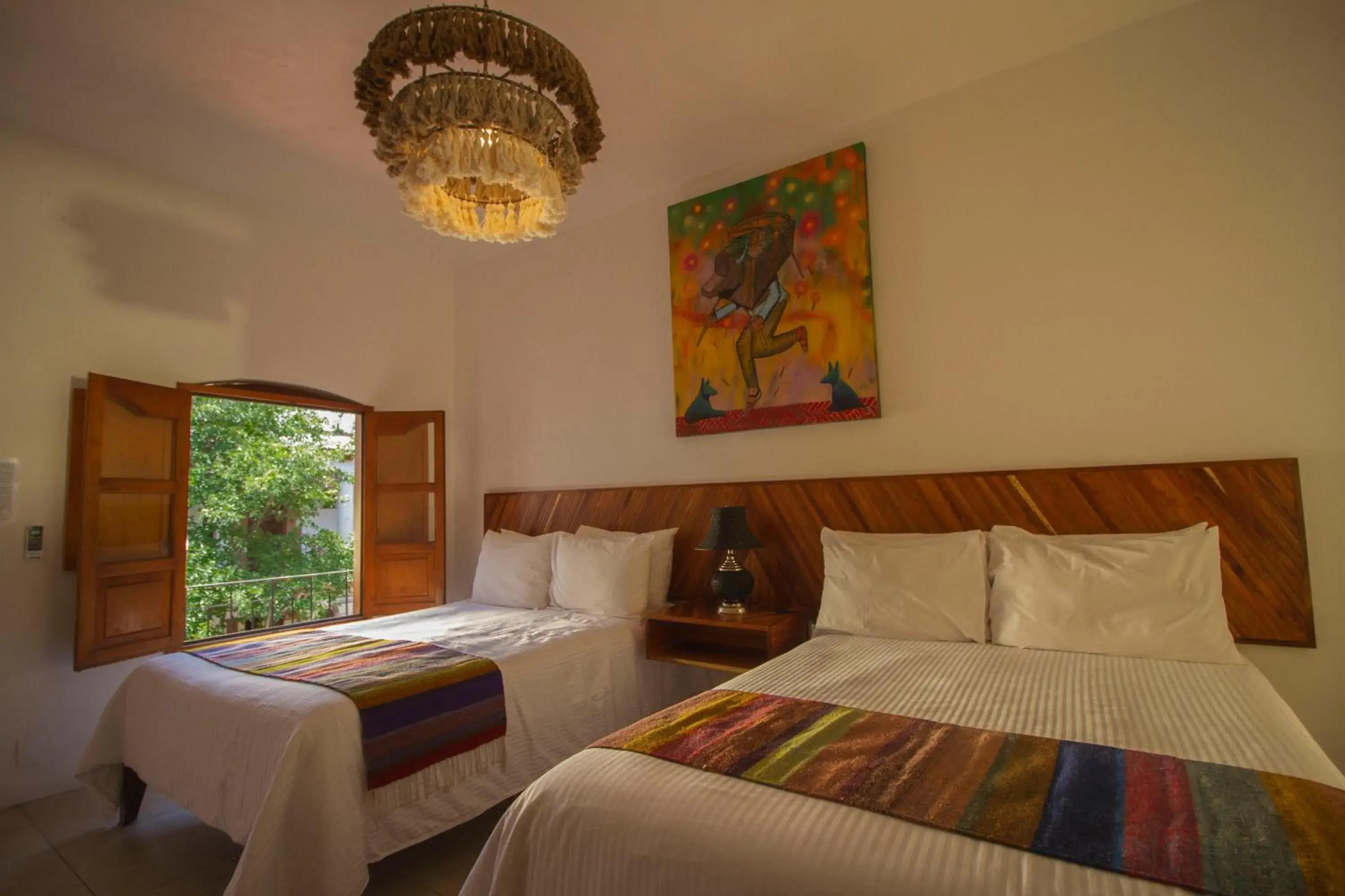 Bed in NaNa Vida Hotel Oaxaca