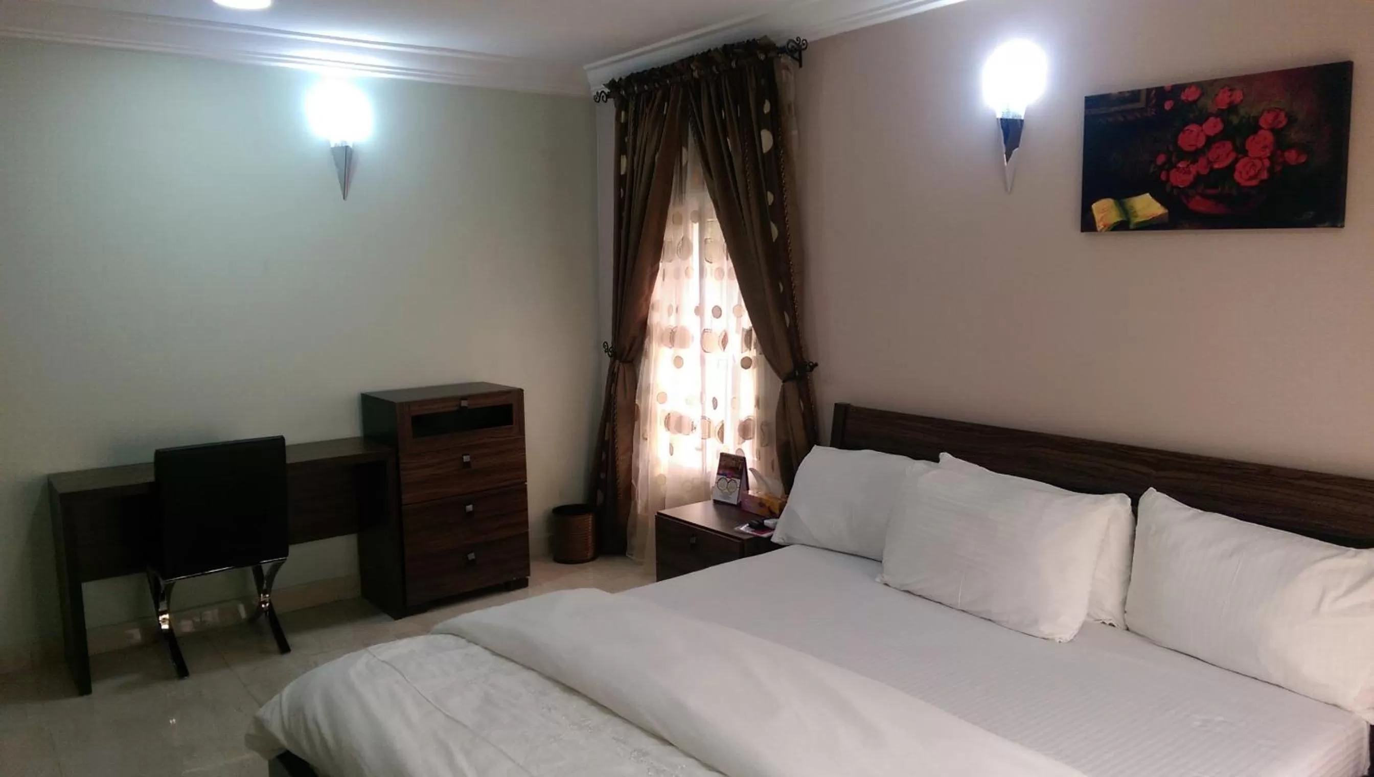 Bed in KH Lodge Abuja