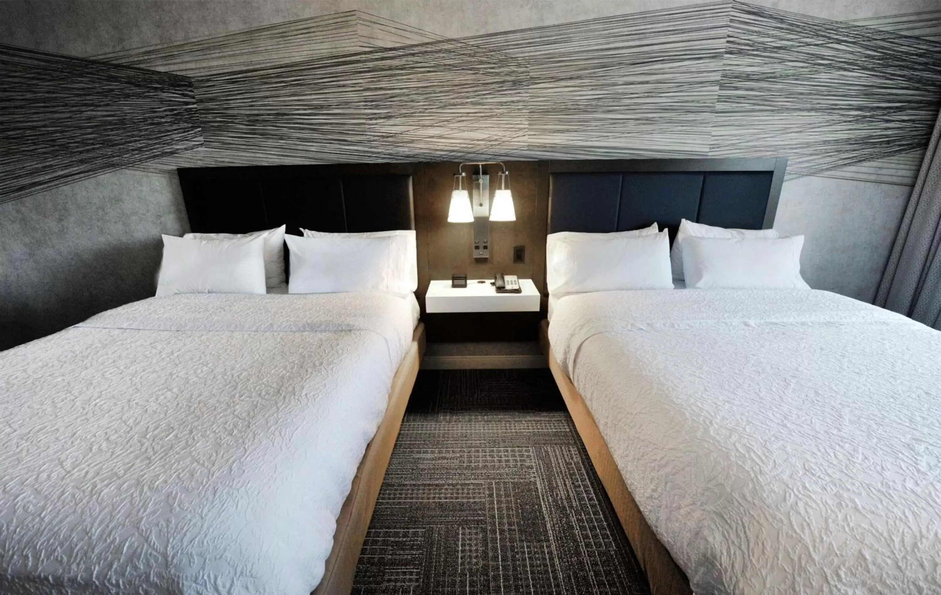 Bed in Hampton Inn & Suites By Hilton Quebec City /Saint-Romuald