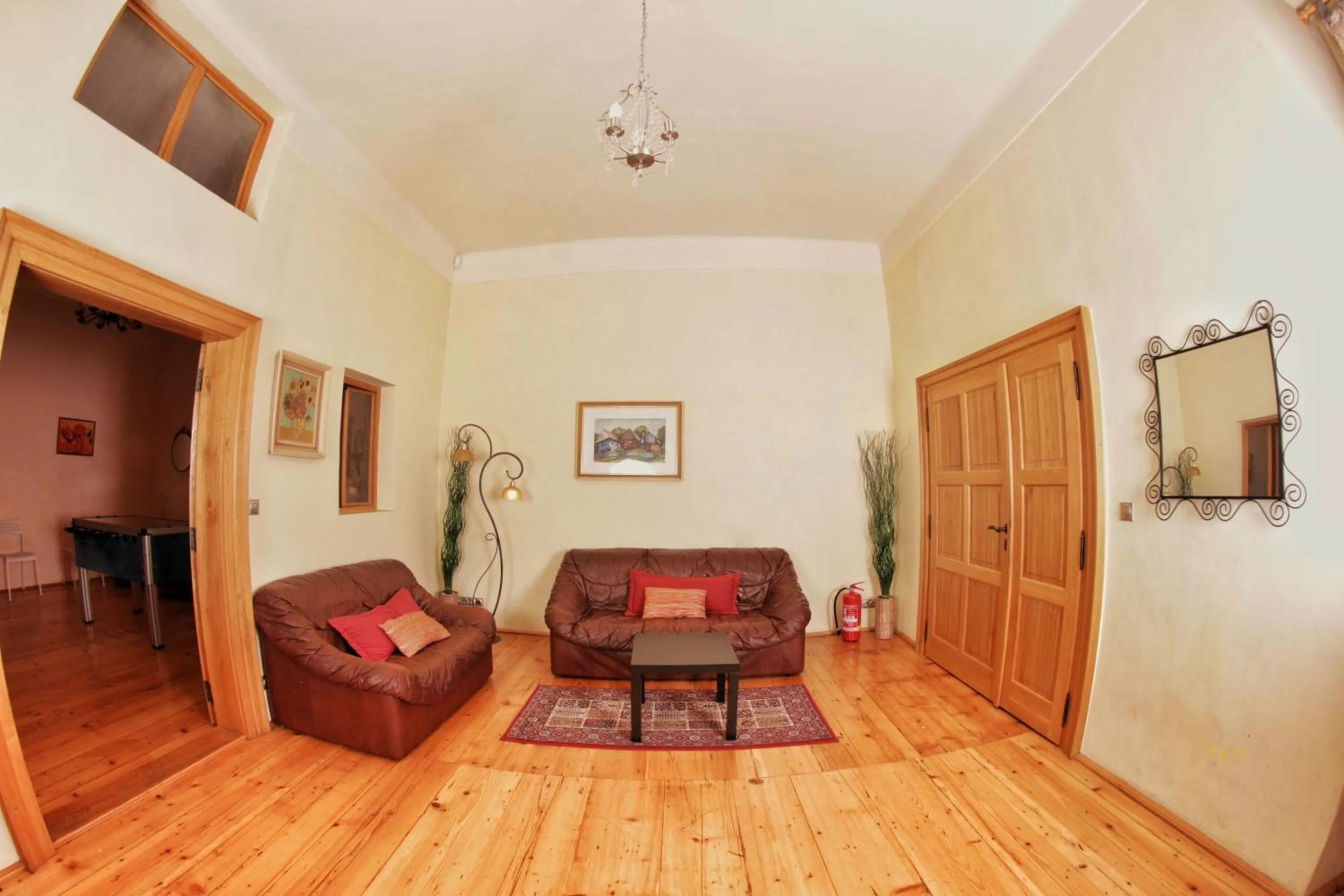 Communal lounge/ TV room in Hostel HOMEr - Old Town Square