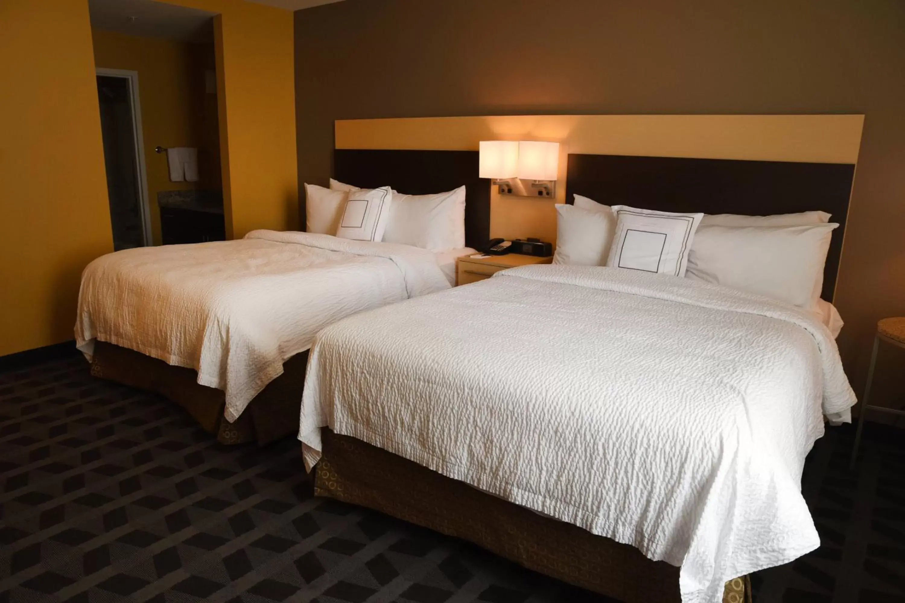 Photo of the whole room, Bed in TownePlace Suites by Marriott Lawrence Downtown