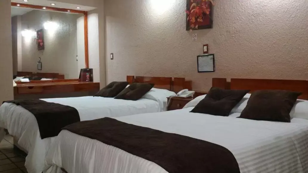 Bed in Hotel Cabildos