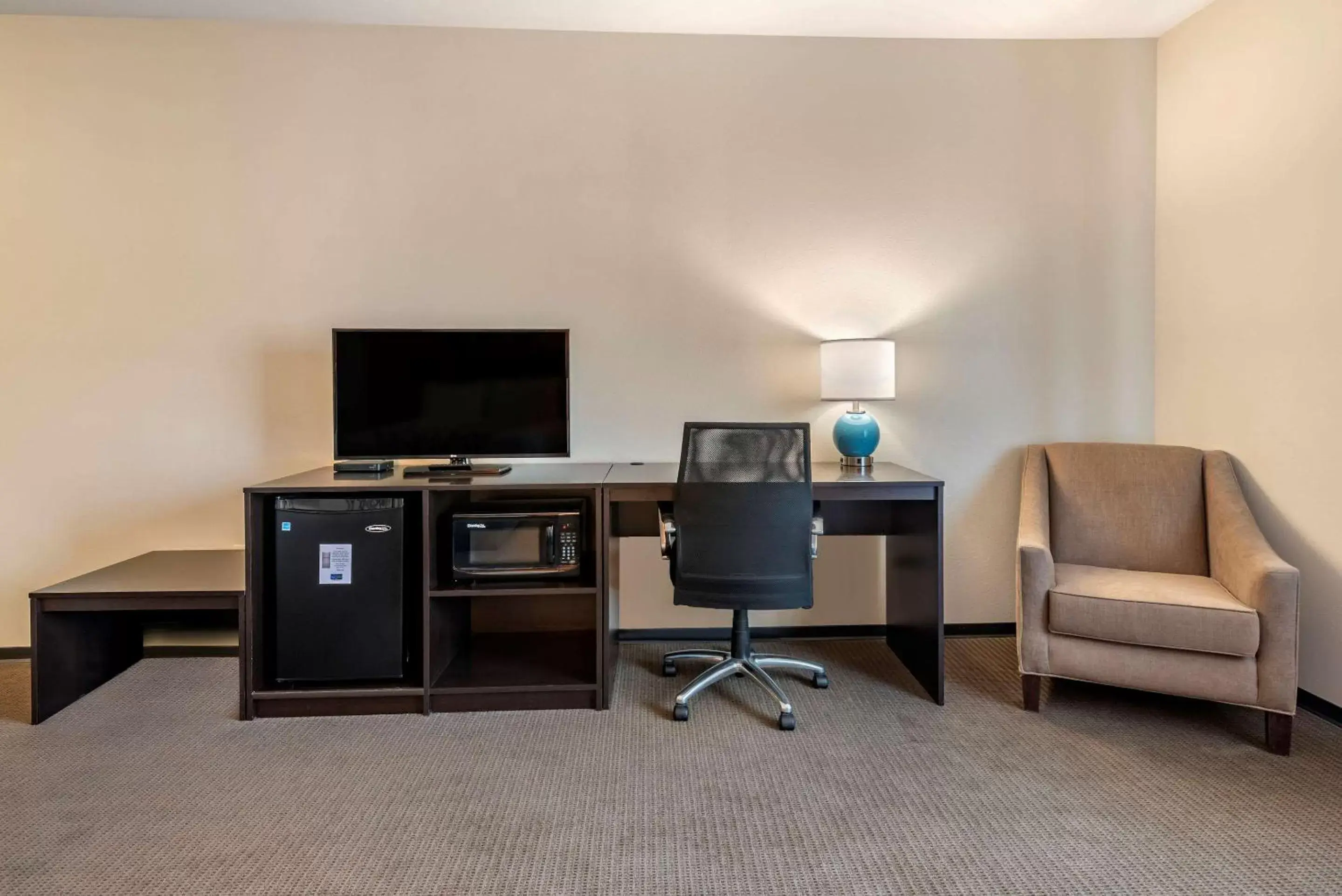 Photo of the whole room, TV/Entertainment Center in Sleep Inn & Suites Moab near Arches National Park