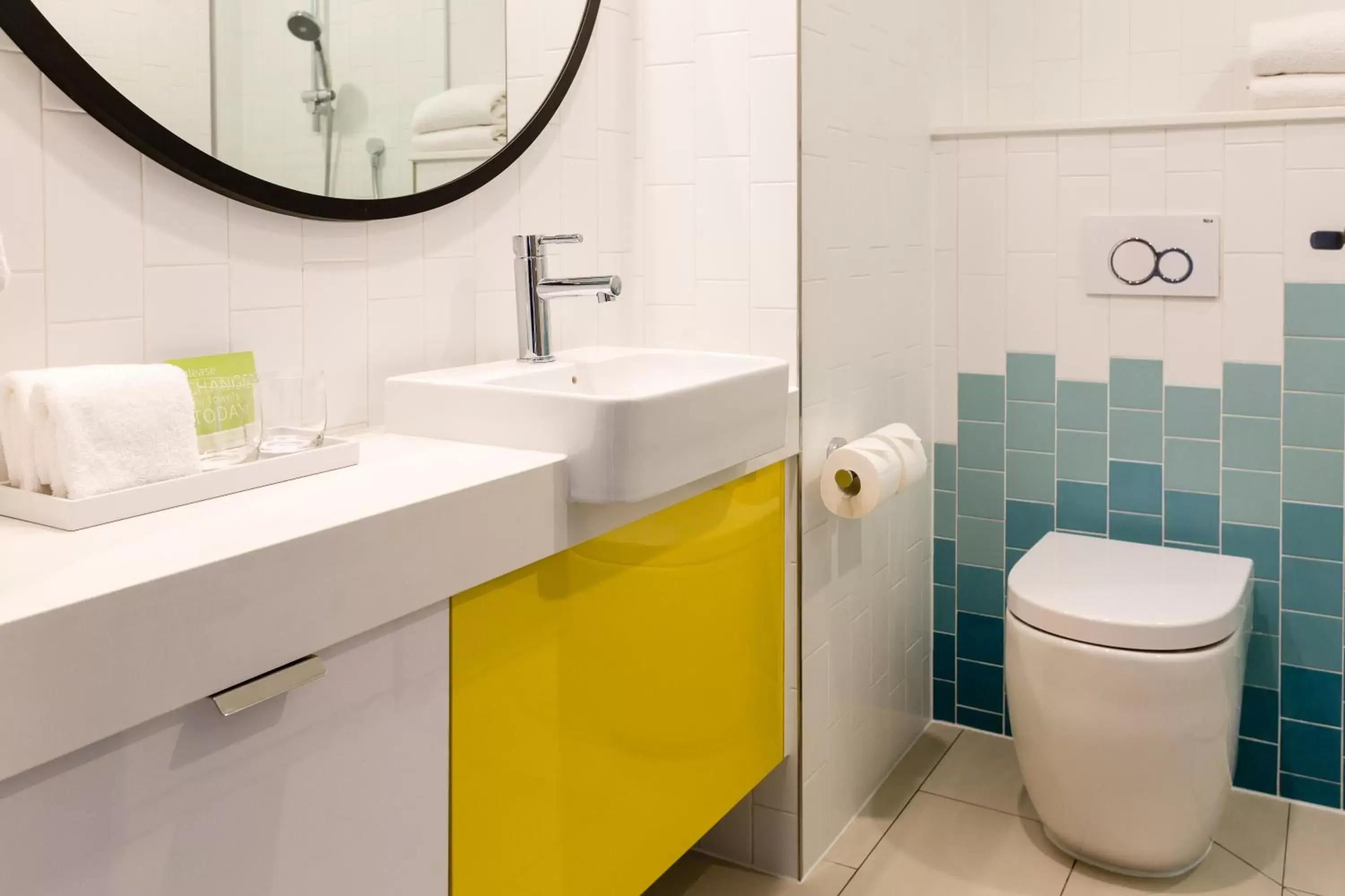 Bathroom in ibis Styles East Perth