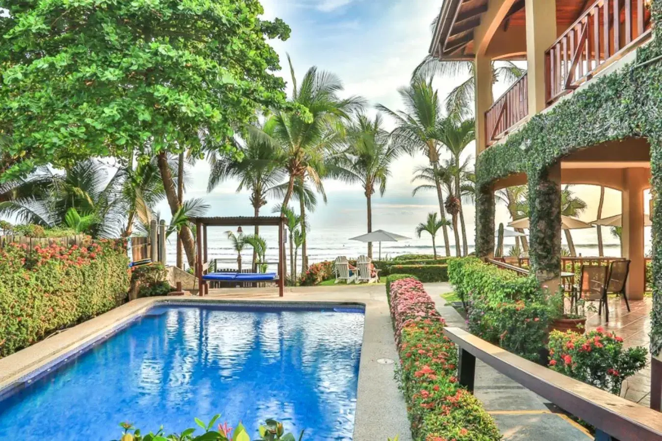 Swimming Pool in The Backyard Beachfront Hotel