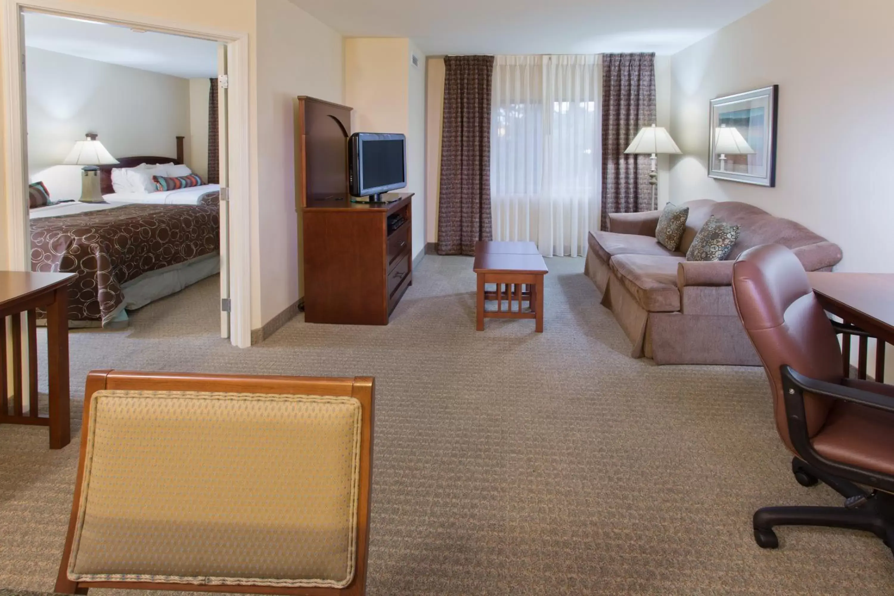 Bedroom, Seating Area in Staybridge Suites Everett - Paine Field, an IHG Hotel