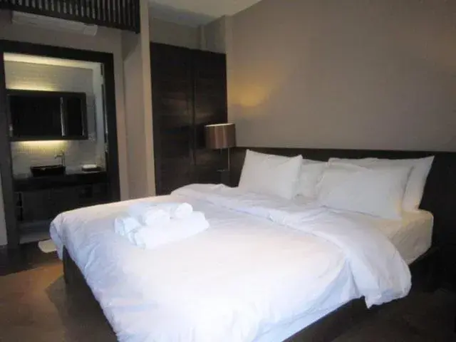 Bed in Chidlom Resort