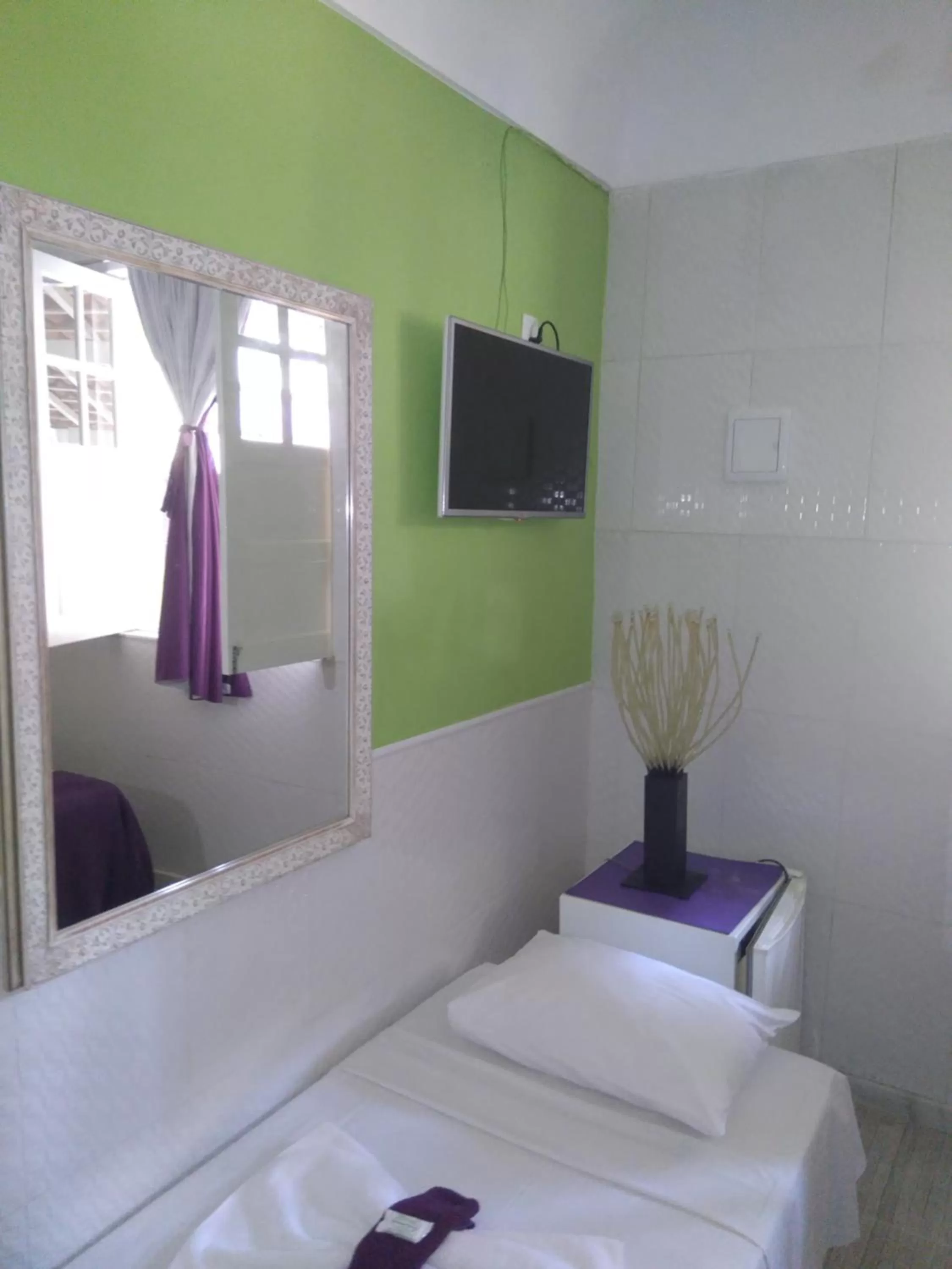 Bed in Hotel Pousada Papaya Verde