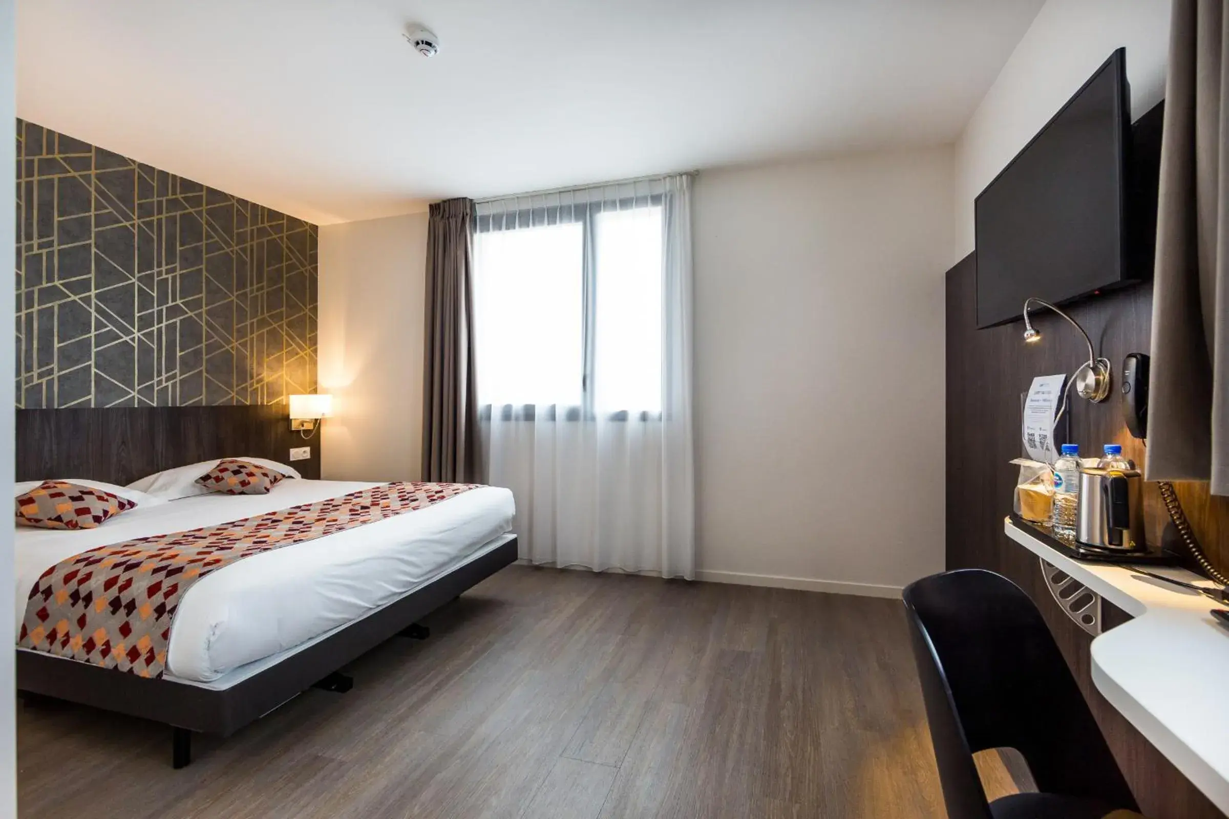 Photo of the whole room in Brit Hotel Ploermel - Hotel de l'Hippodrome