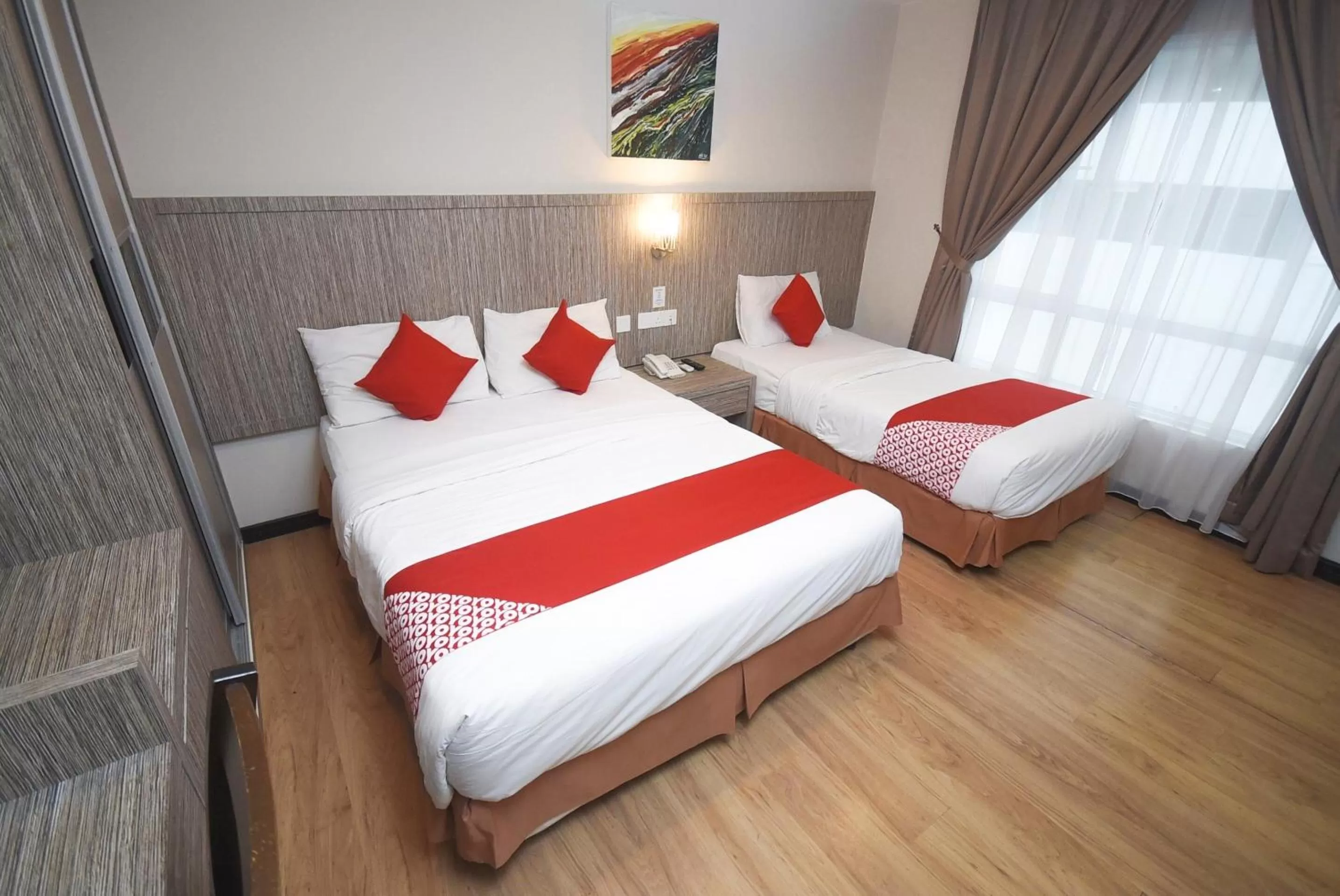 Bed in Super OYO 985 Hotel Nur