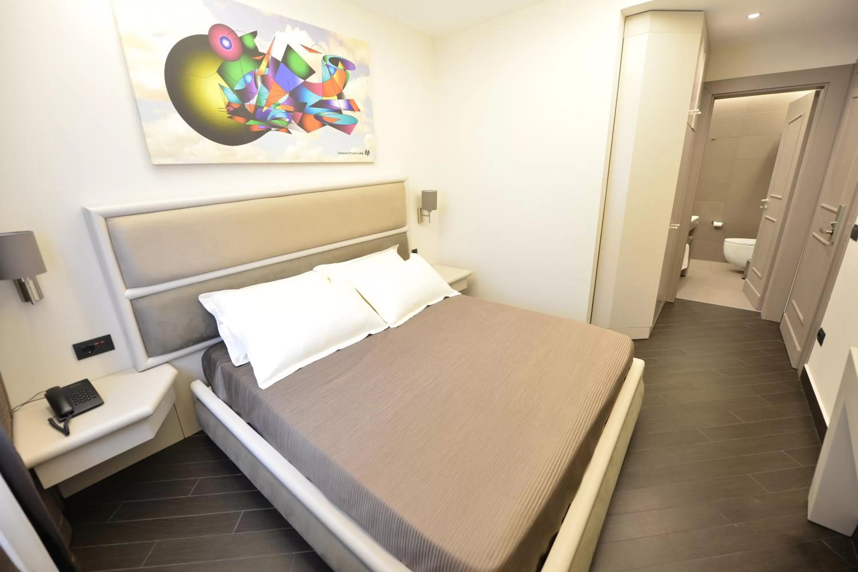 Bed in Petit Hotel Elita