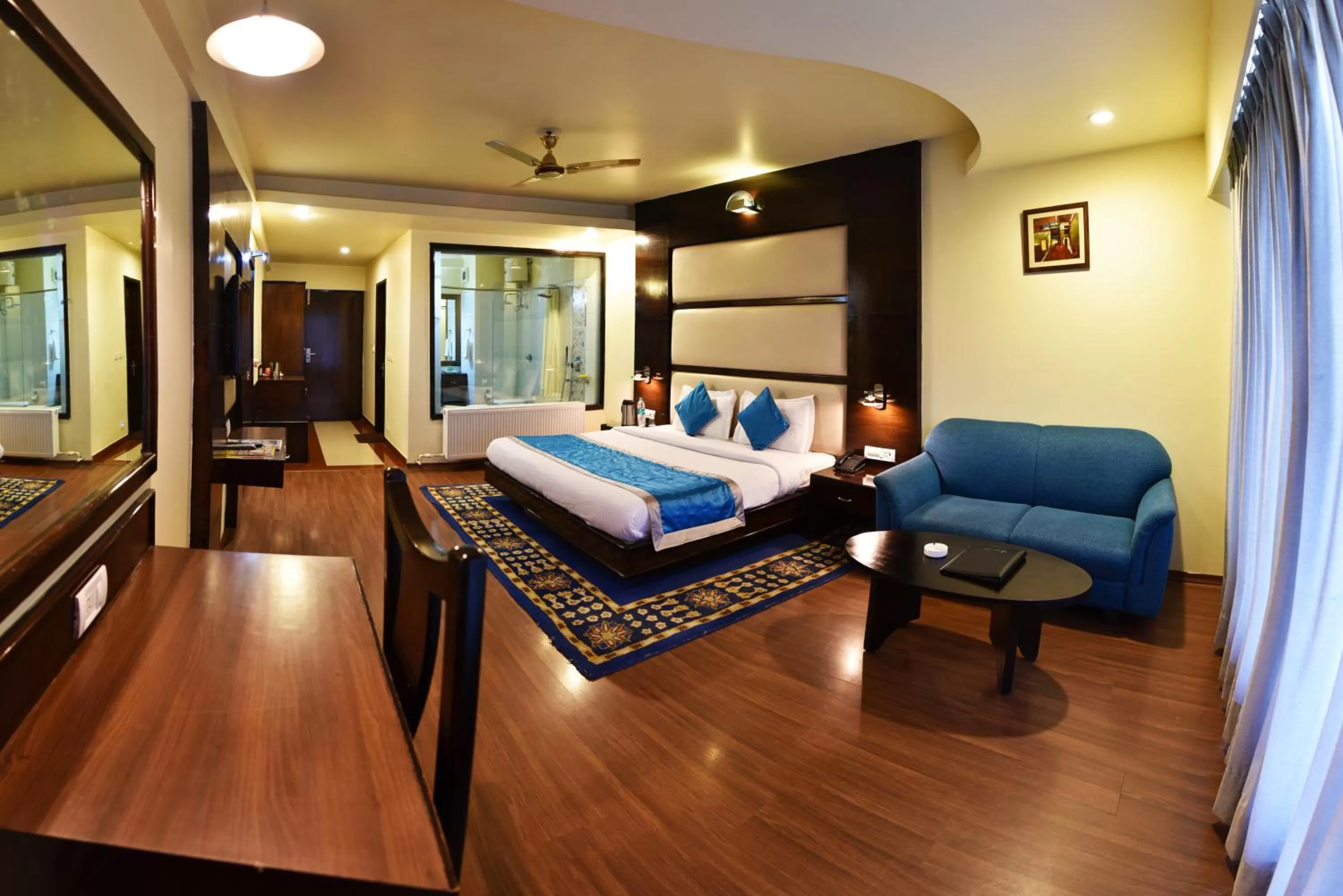 Photo of the whole room, Bed in Indraprastha Resort - Centrally Heated Rooms, with Gym, Games & Spa