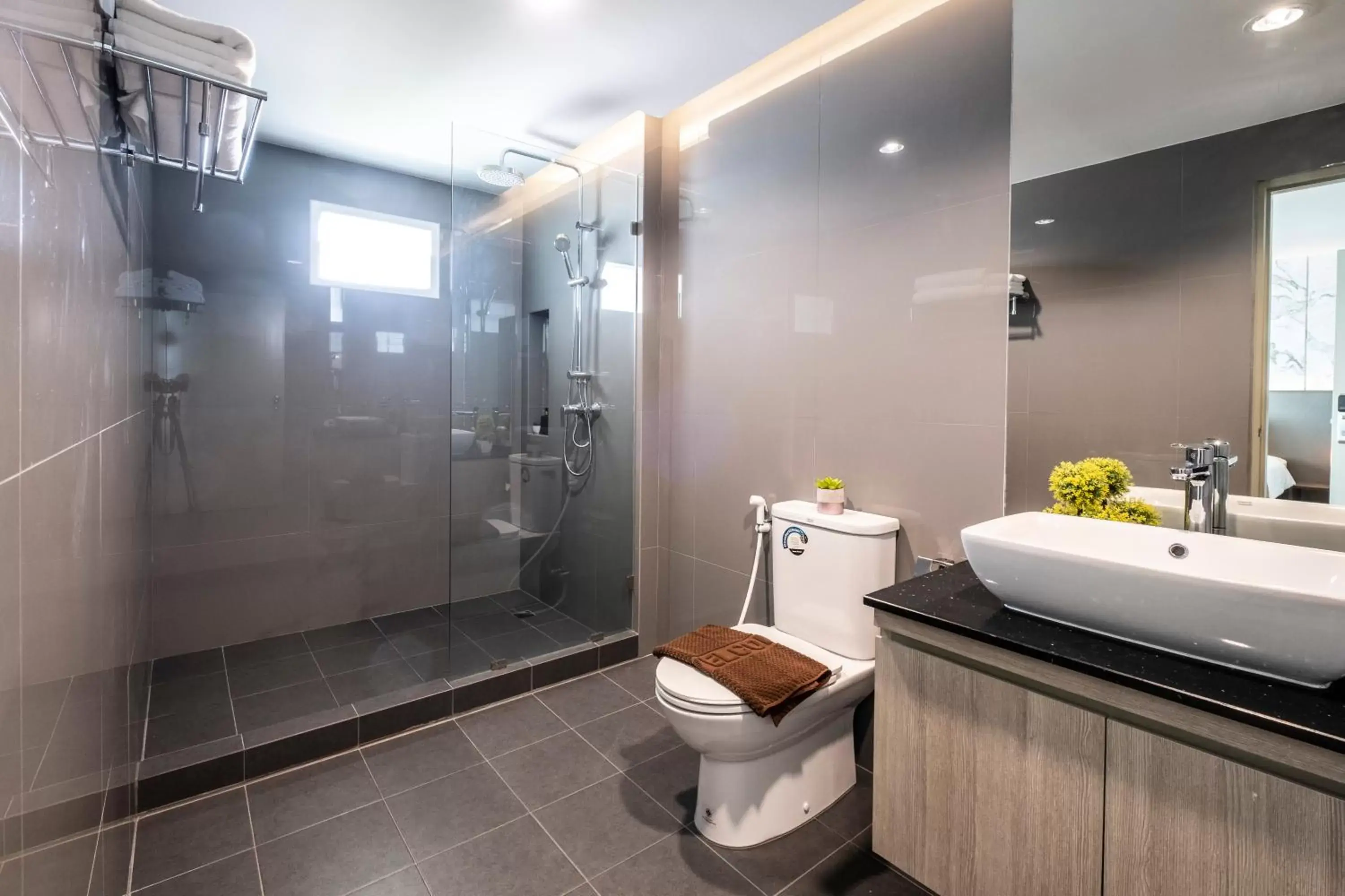Bathroom in Sinsuvarn Airport Suite Hotel SHA Extra Plus Certified B5040