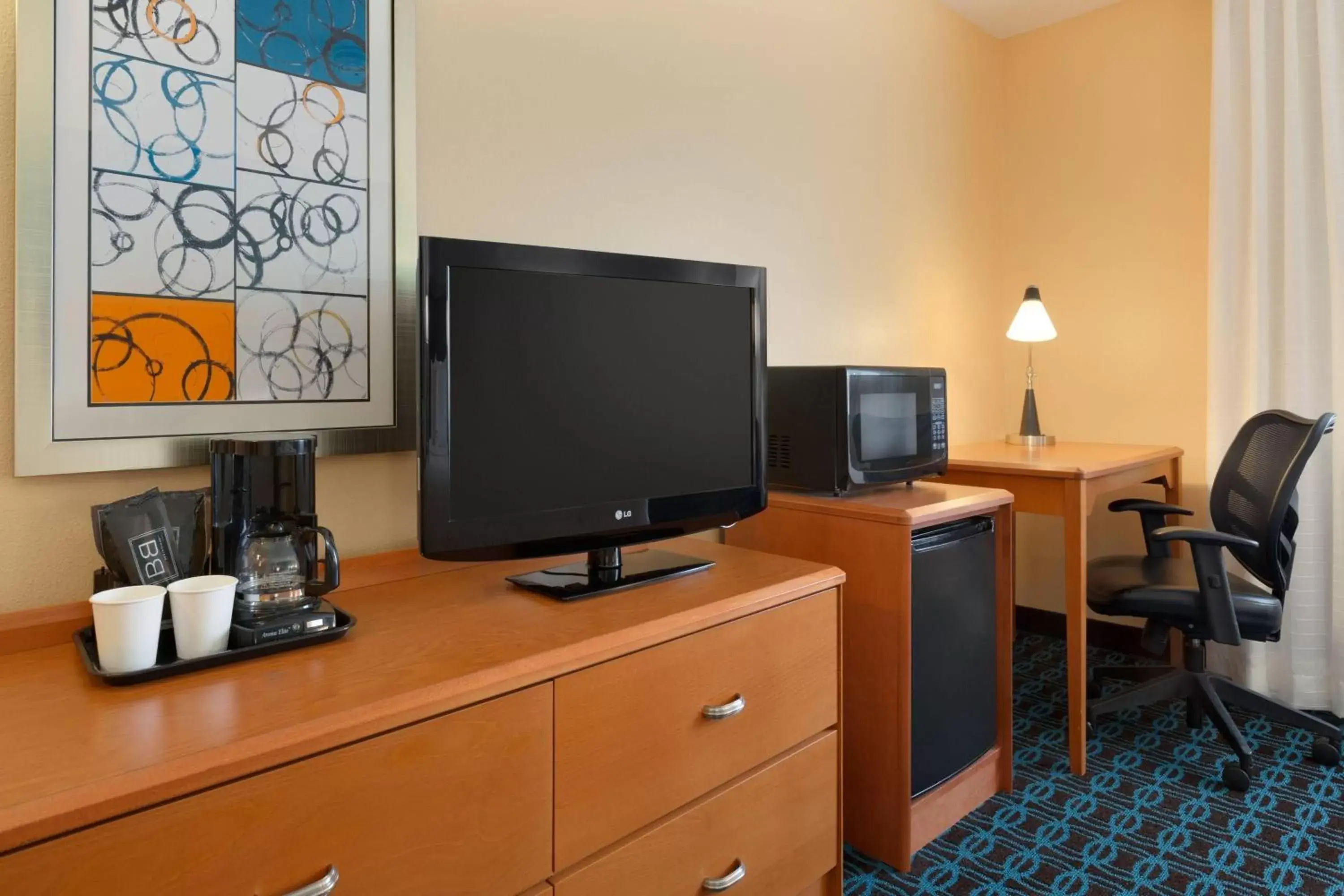 Photo of the whole room, TV/Entertainment Center in Fairfield Inn & Suites Bismarck North