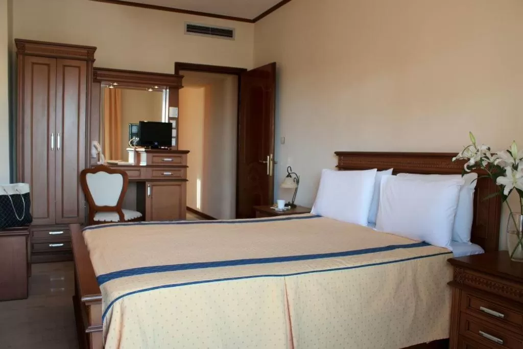 Bed in Famissi Hotel