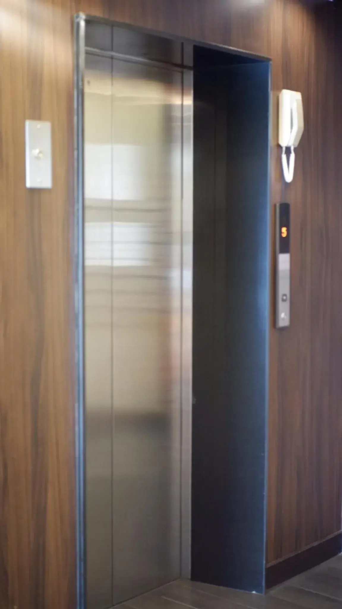 elevator in 14 Living
